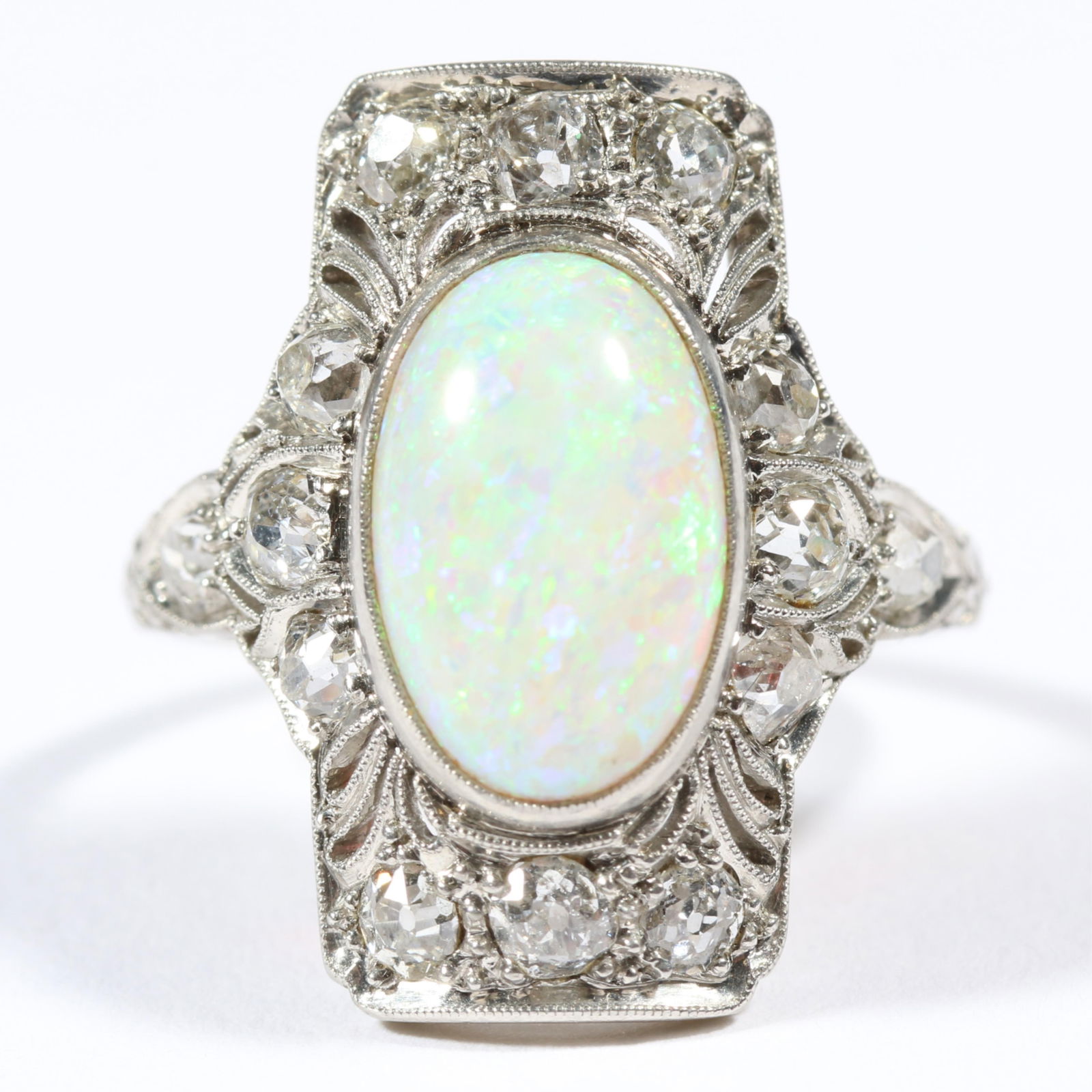 Edwardian platinum opal and diamond ring, unmarked. Ring size 6. (1 of 10)