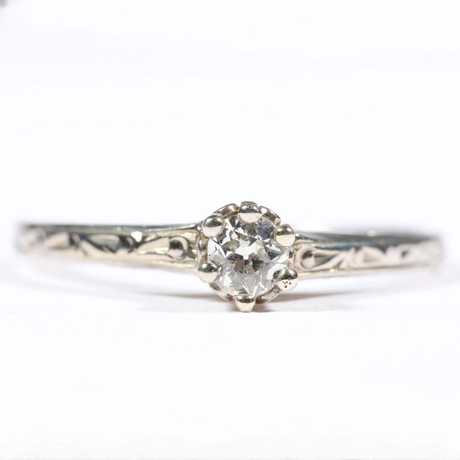 14K white gold Art Deco diamond solitaire ring with engraved shank. Ring size 7. (1 of 11)