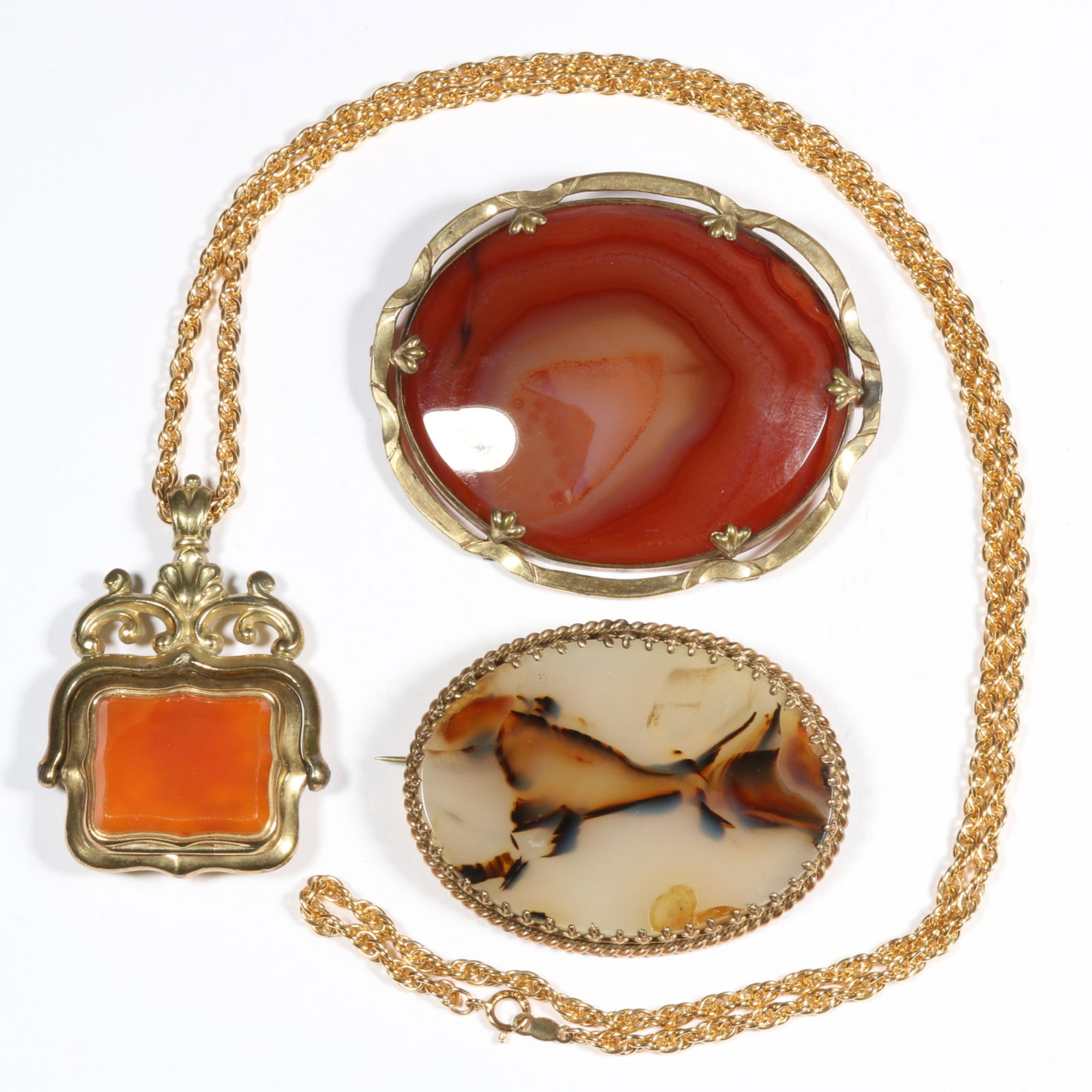 Victorian agate swivel pendant on added gold filled chain, and pair of Victorian agate brooches. (1 of 9)