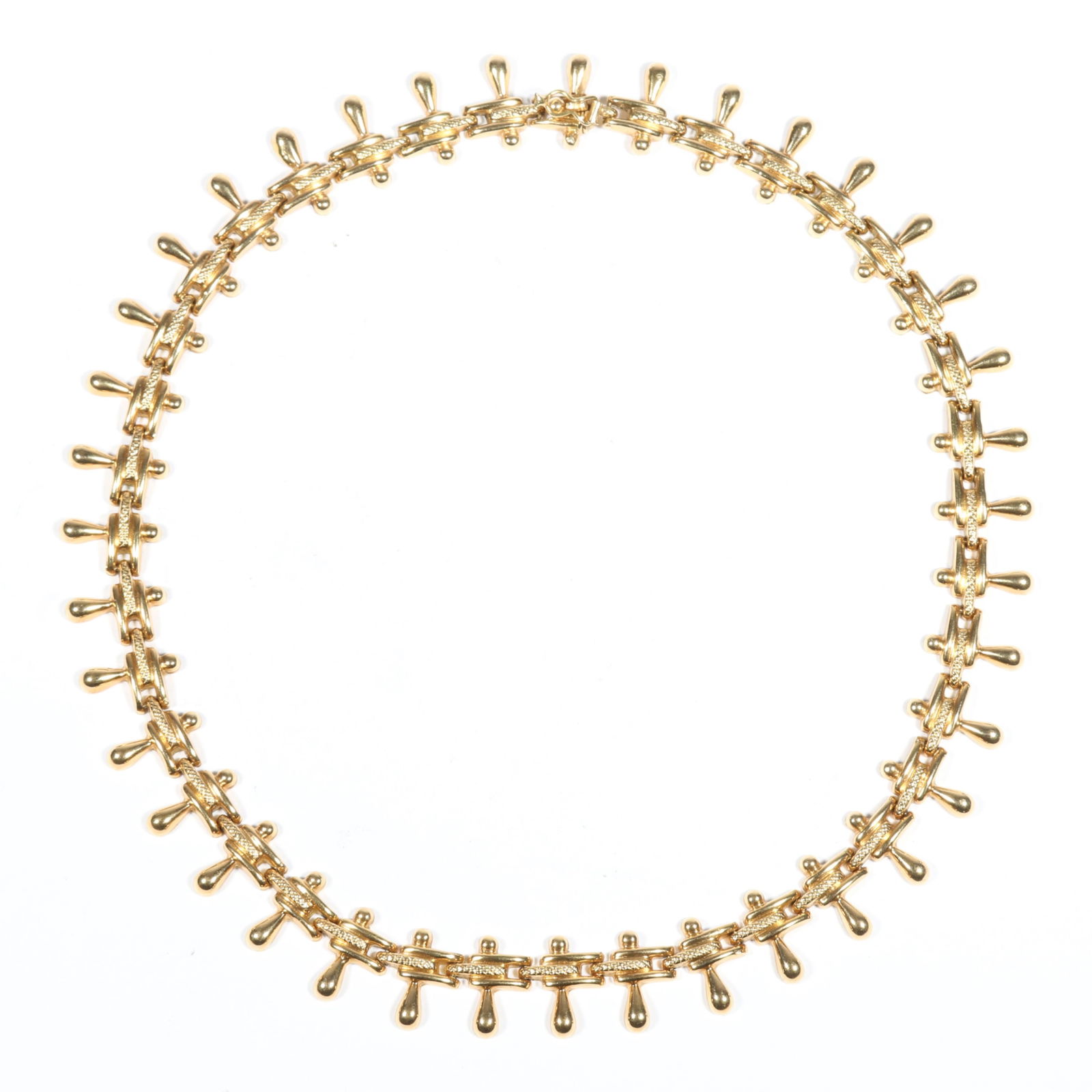 18K yellow gold teardrop choker necklace. 14 1/2"L x 1/2"W: 18K yellow gold teardrop choker necklace. 14.65DWT The purchase of gold requires confirmed funds. 14 1/2"L x 1/2"W