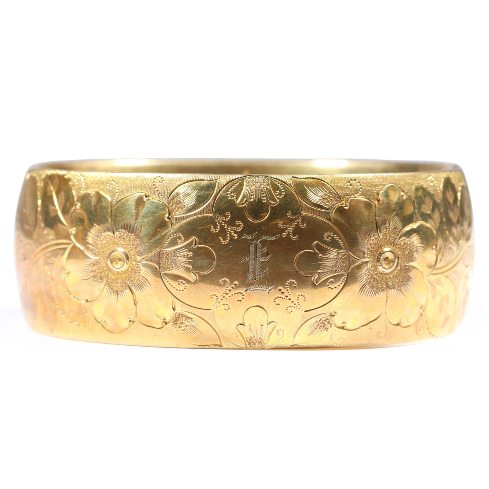 Antique Bates & Bacon wide gold filled engraved monogrammed "E" hinged bangle bracelet in original: Antique Bates & Bacon wide gold filled engraved monogrammed "E" hinged bangle bracelet in original box. Box has damage. 1"H x 2 1/2"Inner Diameter
