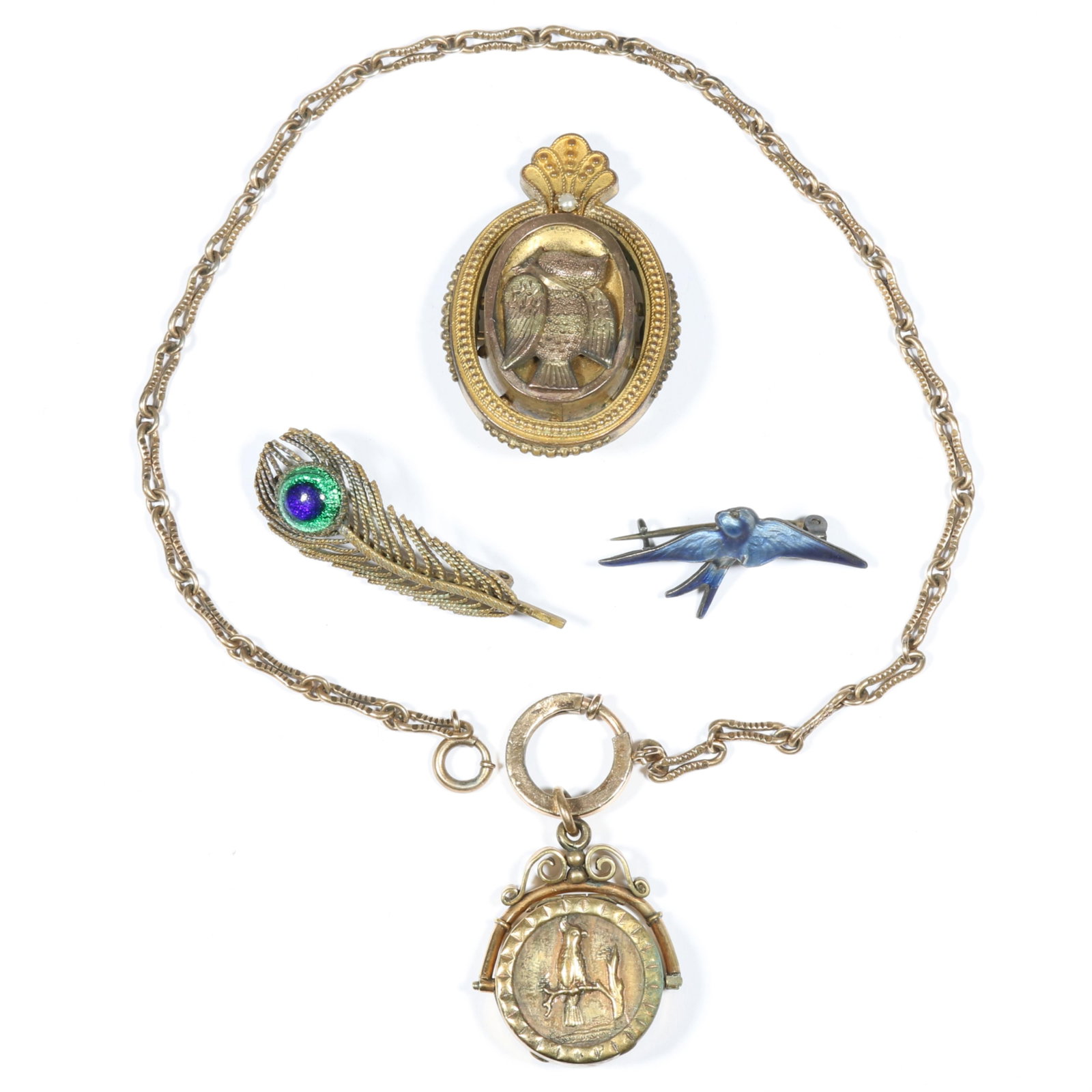 Antique jewelry group including Victorian bird locket, French sterling enamel blue bird pin, peacock: Antique jewelry group including Victorian bird locket, French sterling enamel blue bird pin, peacock glass peacock feather pin, and large pigeon brooch. Pigeon brooch is missing back locket panel. Blu
