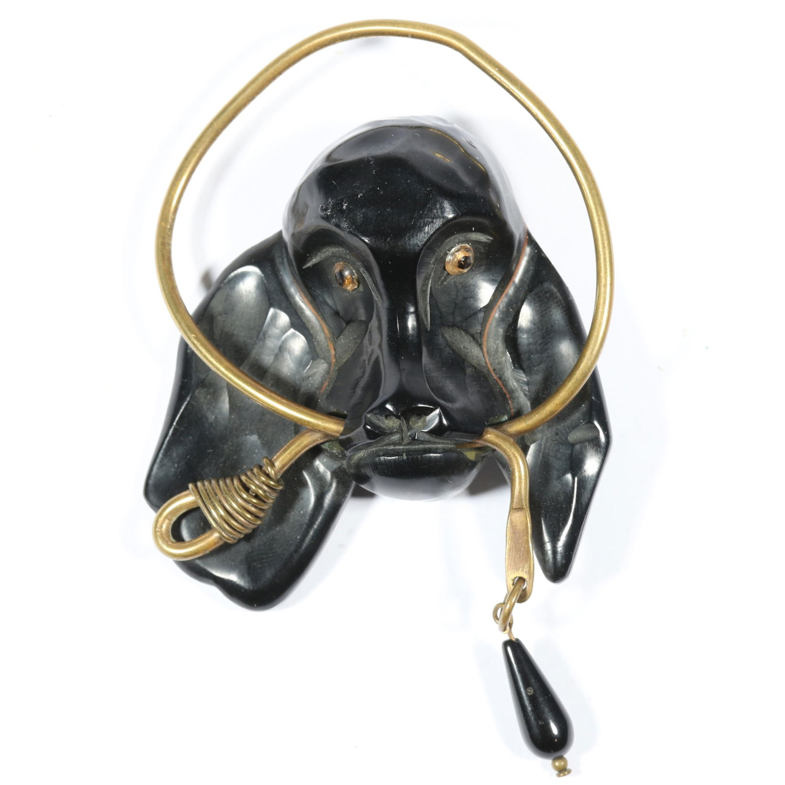 Vintage black Bakelite dog brooch with brass leash and glass eyes. 4"Drop x 2 1/2"W: Vintage black Bakelite dog brooch with brass leash and glass eyes. 4"Drop x 2 1/2"W