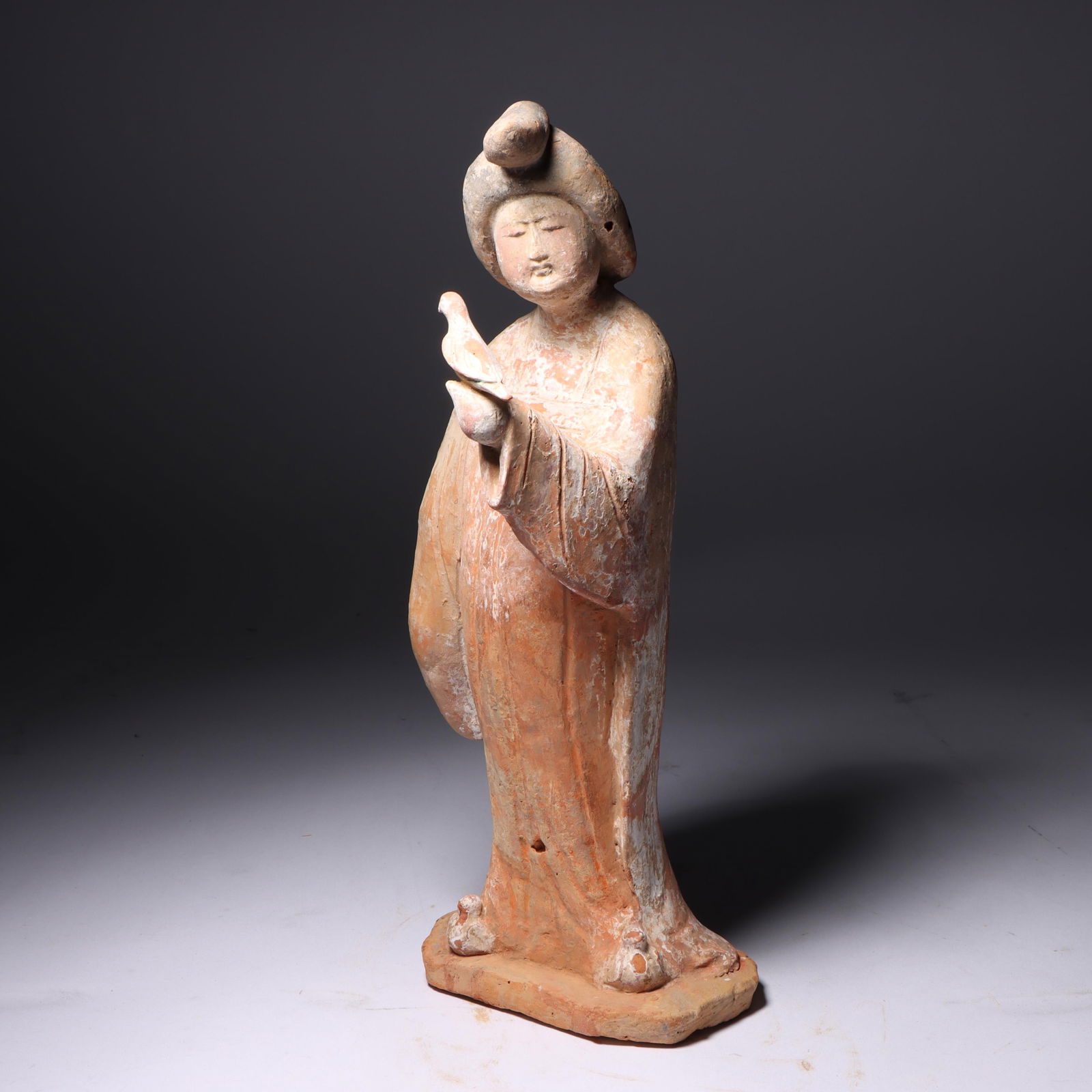 Chinese Tang Dynasty polychrome terracotta pottery figure of a court lady holding a bird, 618 AD-907 (1 of 11)