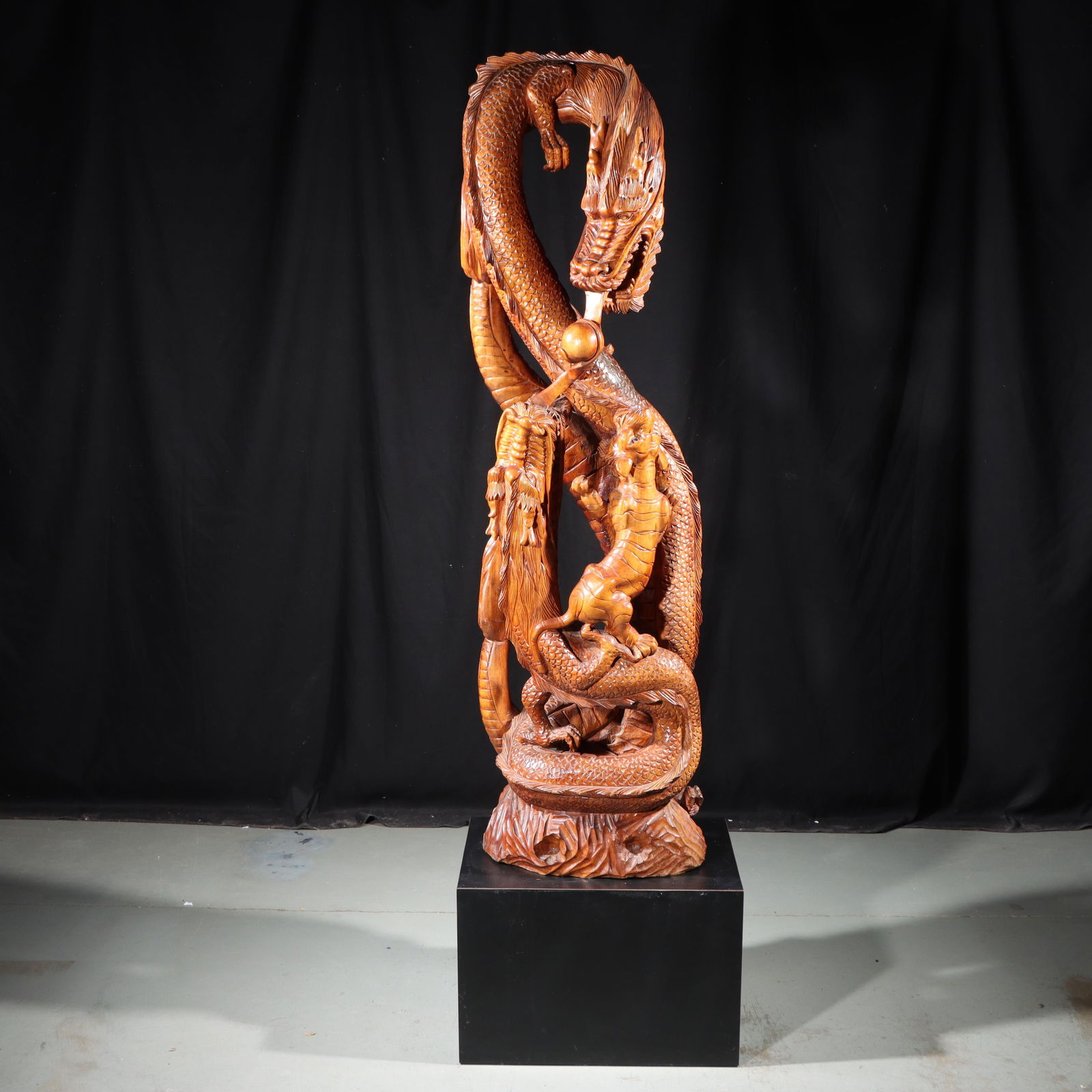 Chinese / Asian 5ft. hand carved wood fighting dragons, tiger, pearl temple guardian statue figure: Chinese / Asian 5ft. hand carved wood fighting dragons, tiger, pearl temple guardian statue figure group on base. Spectacular detail. Two repairs present. Minor nicks and scratches. 61"H x 17 1/2"W (s