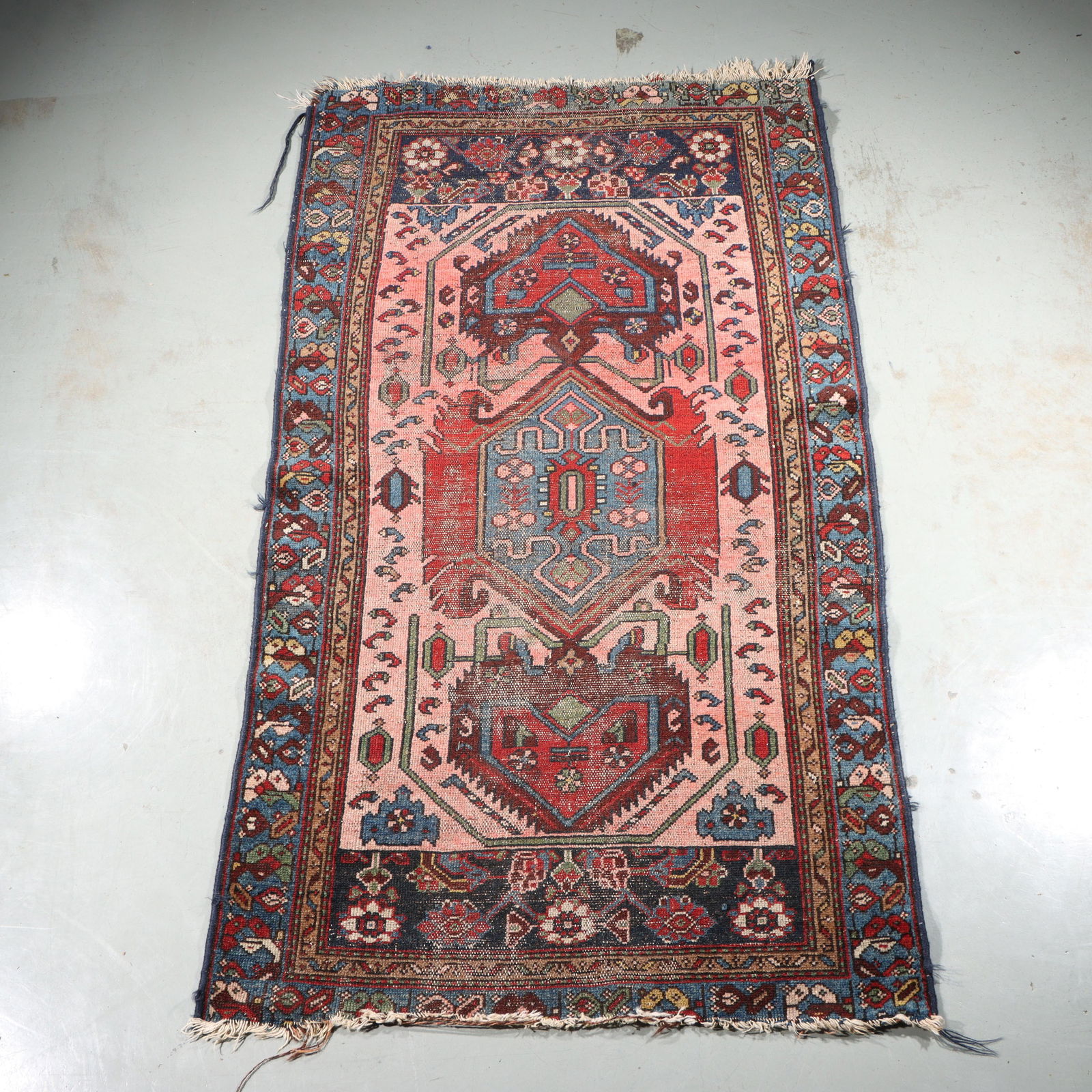 Antique Hamadan hand knotted estate rug / carpet, ca. 1890, 5.5x3. 69"H x 36"W: Antique Hamadan hand knotted estate rug / carpet, ca. 1890, 5.5x3. Ivory and navy. Significant wear and fraying edges. Provenance: From the estate of Jim and Anna White, Indianapolis, IN 69"H x 36"W