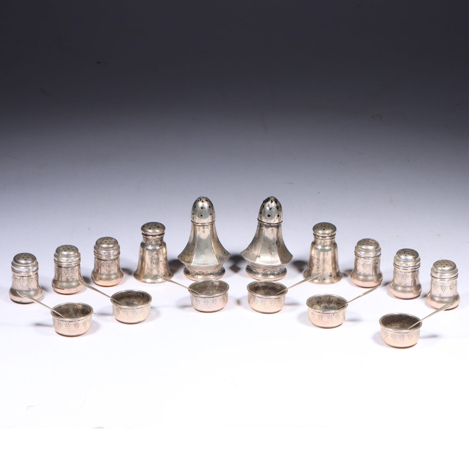 Collection of sterling silver salt and pepper shakers, and individual salt cellars with spoons, (1 of 14)