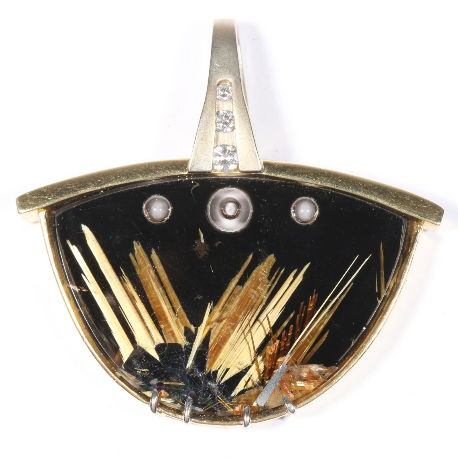 18K yellow gold and 14K white gold artisan hematite in rutile quartz with onyx back stone, three: 18K yellow gold and 14K white gold artisan hematite in rutile quartz with onyx back stone, three circle cut outs, and three diamond accents, unmarked tested. 19.10DWT 3 diamonds, 3.20-2.05 mm each, es