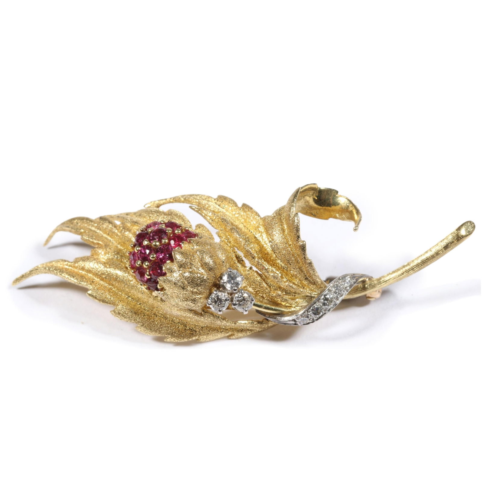 18K yellow Gold Ornata floral bud brooch decorated with rubies and diamonds. 2 5/8"L x 7/8"W: 18K yellow Gold Ornata floral bud brooch decorated with rubies and diamonds. 9.689DWT The purchase of gold requires confirmed funds. 2 5/8"L x 7/8"W