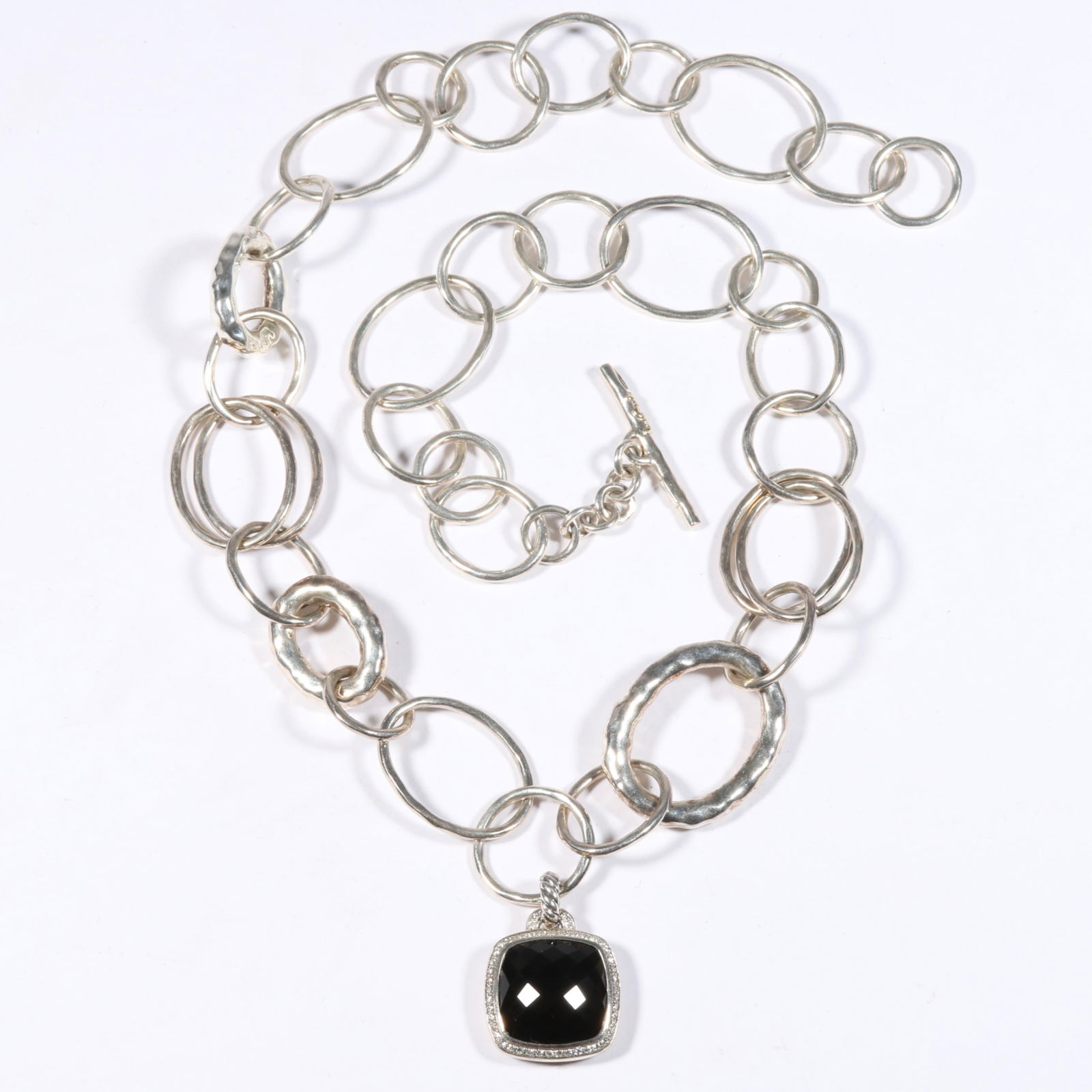 David Yurman sterling silver onyx and diamond halo pendant on an Ippolita sterling silver chain link: David Yurman sterling silver onyx and diamond halo pendant on an Ippolita sterling silver chain link necklace 77.4g 22"L x 1 7/8"Drop
