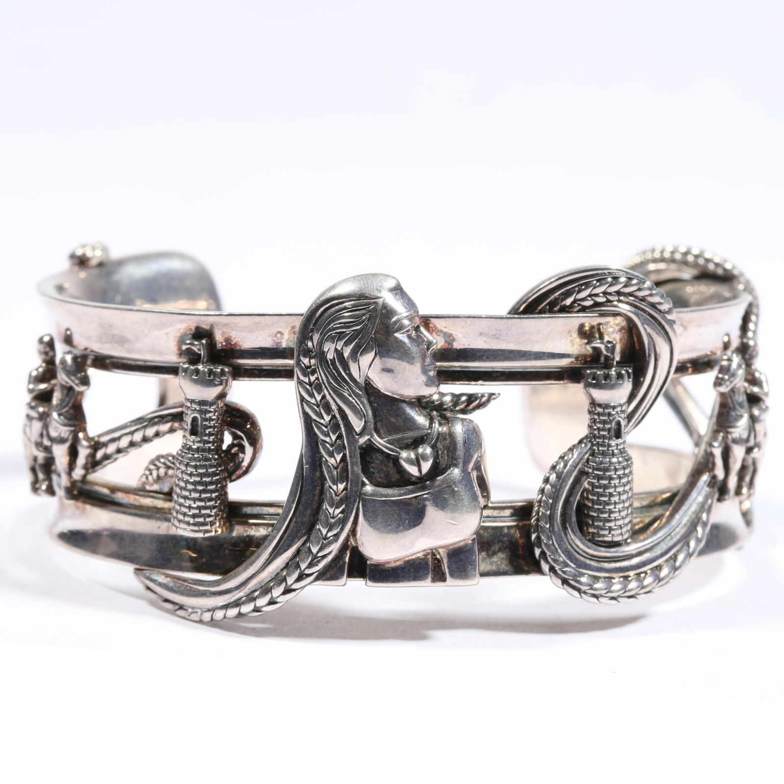 Barry Kieselstein Cord sterling silver Rapunzel bracelet depicting tower and knight on horse with: Barry Kieselstein Cord sterling silver Rapunzel bracelet depicting tower and knight on horse with Rapunzel's hair wrapped around the cuff. 99.4g From the life time collection of Donna Soodalter-Toman,