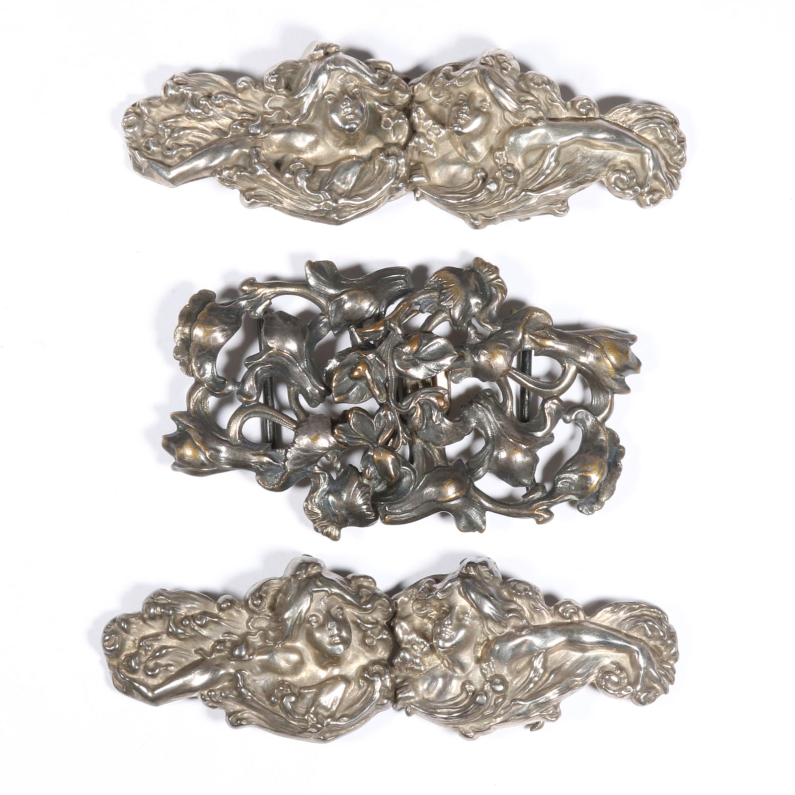 3pc Art Nouveau antique buckle group including pair of William Kerr sterling silver repouss? Water: 3pc Art Nouveau antique buckle group including pair of William Kerr sterling silver repouss? Water Nymph lady buckles, and unsigned floral design buckle 4"L x 1 1/4"W (ladies)