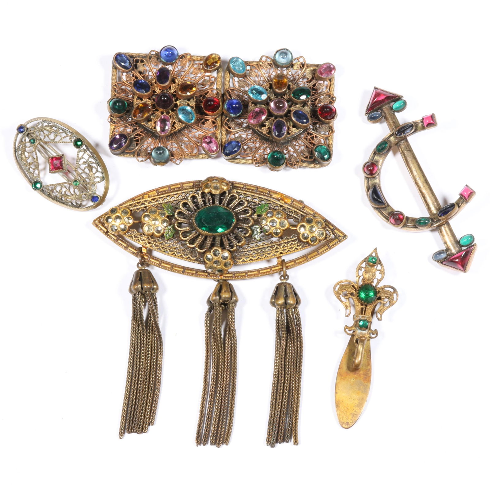 Vintage jewel tone Czech glass jewelry group including arrow through horseshoe brooch, buckle,: Vintage jewel tone Czech glass jewelry group including arrow through horseshoe brooch, buckle, chatelaine top, and more. Provenance: From the collection of Sue Rudman, owner of Antique Source, Ltd in