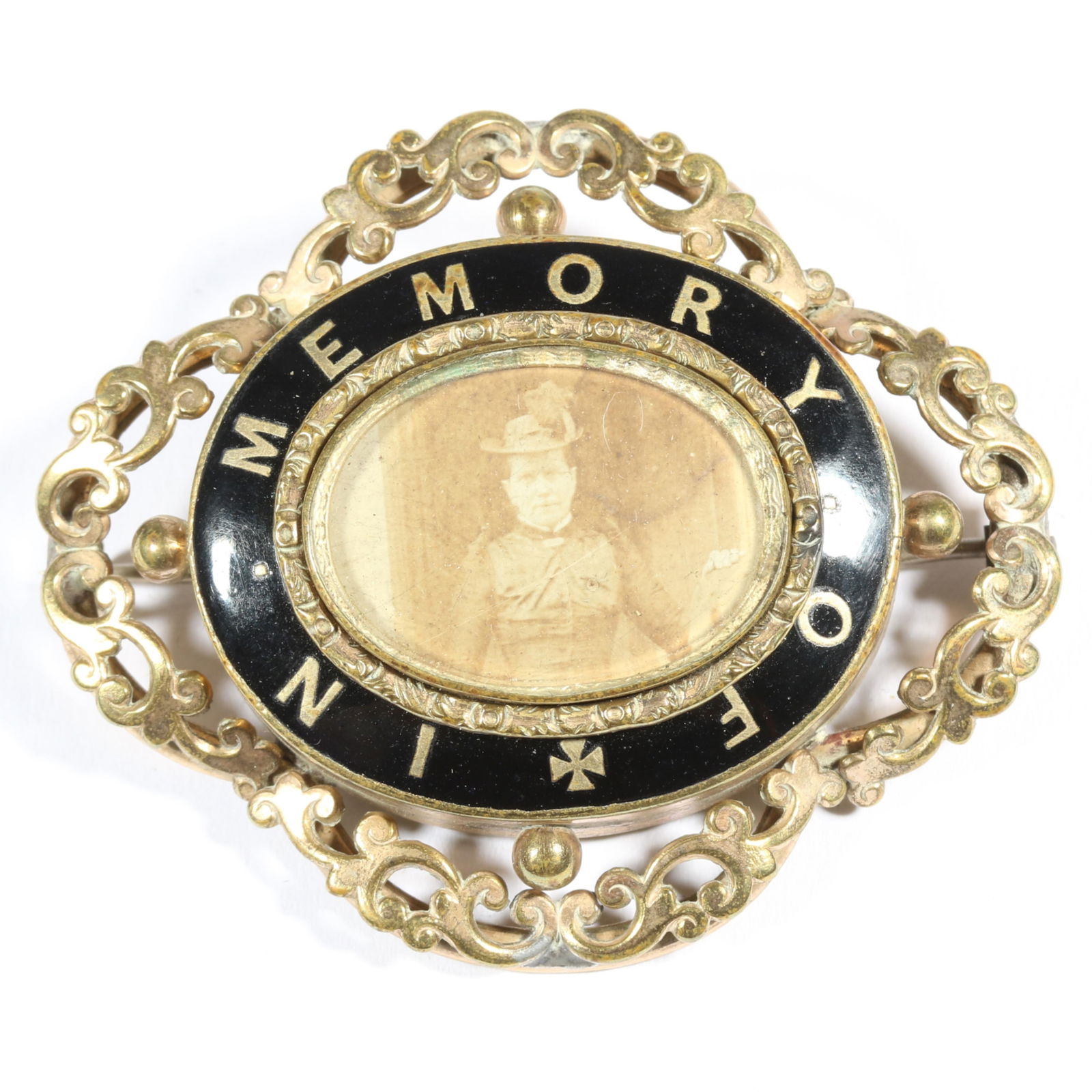 Victorian "In Memory Of" enamel mourning brooch locket with antique photo inside. 2"H x 2 1/4"W: Victorian "In Memory Of" enamel mourning brooch locket with antique photo inside. Provenance: From the collection of Sue Rudman, owner of Antique Source, Ltd in NYC for more than 45 years. 2"H x 2 1/4