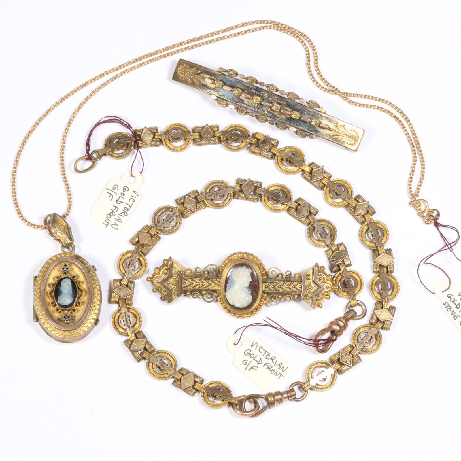 Antique Victorian hardstone cameo locket and brooch with ornate book chain with gold fronts and bar: Antique Victorian hardstone cameo locket and brooch with ornate book chain with gold fronts and bar pin. Some wear to gold fill, Gold filled chain added to locket. Provenance: From the collection of S