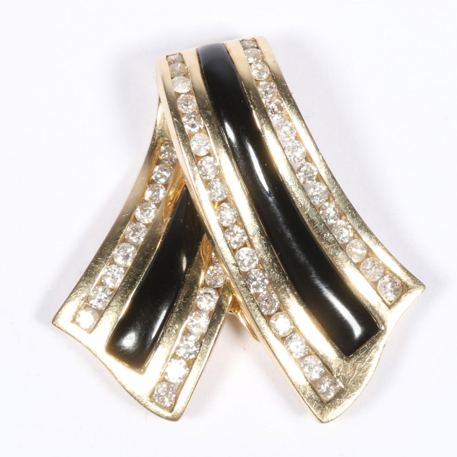 14K yellow gold pendant / scarf clasp with onyx and diamond detail: 14K yellow gold pendant / scarf clasp with onyx and diamond detail1 1/8"H x 1 1/8"W5.65 dwtThe purchase of gold requires confirmed funds.