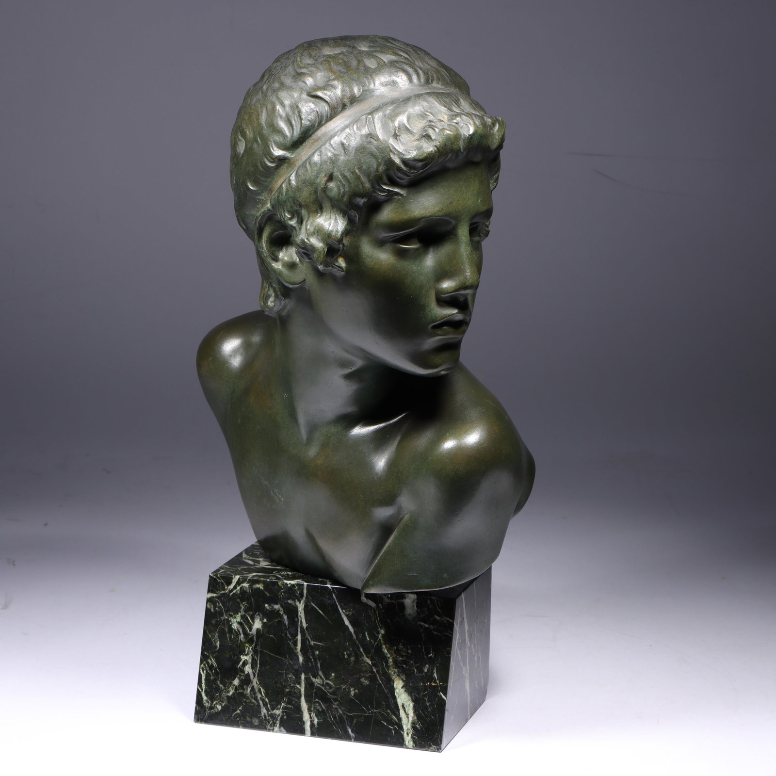Constant Ambroise Roux, French (1865 - 1929), Young Achilles, patinated bronze male bust on marble: Constant Ambroise Roux French (1865 - 1929) Young Achilles patinated bronze male bust on marble block base Inscribed verso. Biography from Bukowski Stockholm The French sculptor Constant Roux, was bor