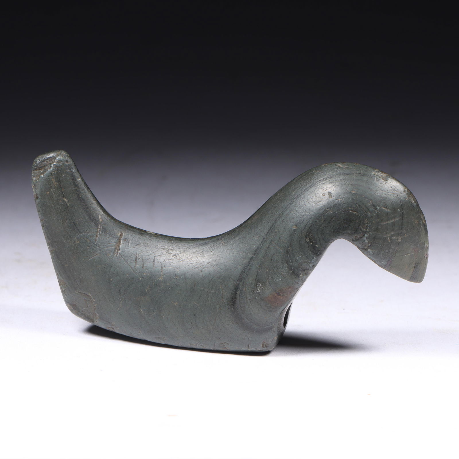 Birdstone, Slate, Glacial Kame: 4 x 1 7/8 Medina Co. Ohio: Birdstone, Slate, Glacial Kame: prehistoric artifact, Townsend Collection. This bird has a prominent long neck and short beak which has about 3/8" of restoration to the tip. Medina Co. Ohio Provenance