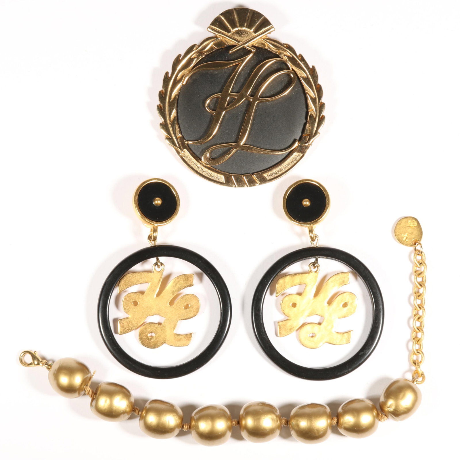 Karl Lagerfeld 3pc group: large monogram pendant brooch, monogram dangle earrings, and hand knotted (1 of 10)