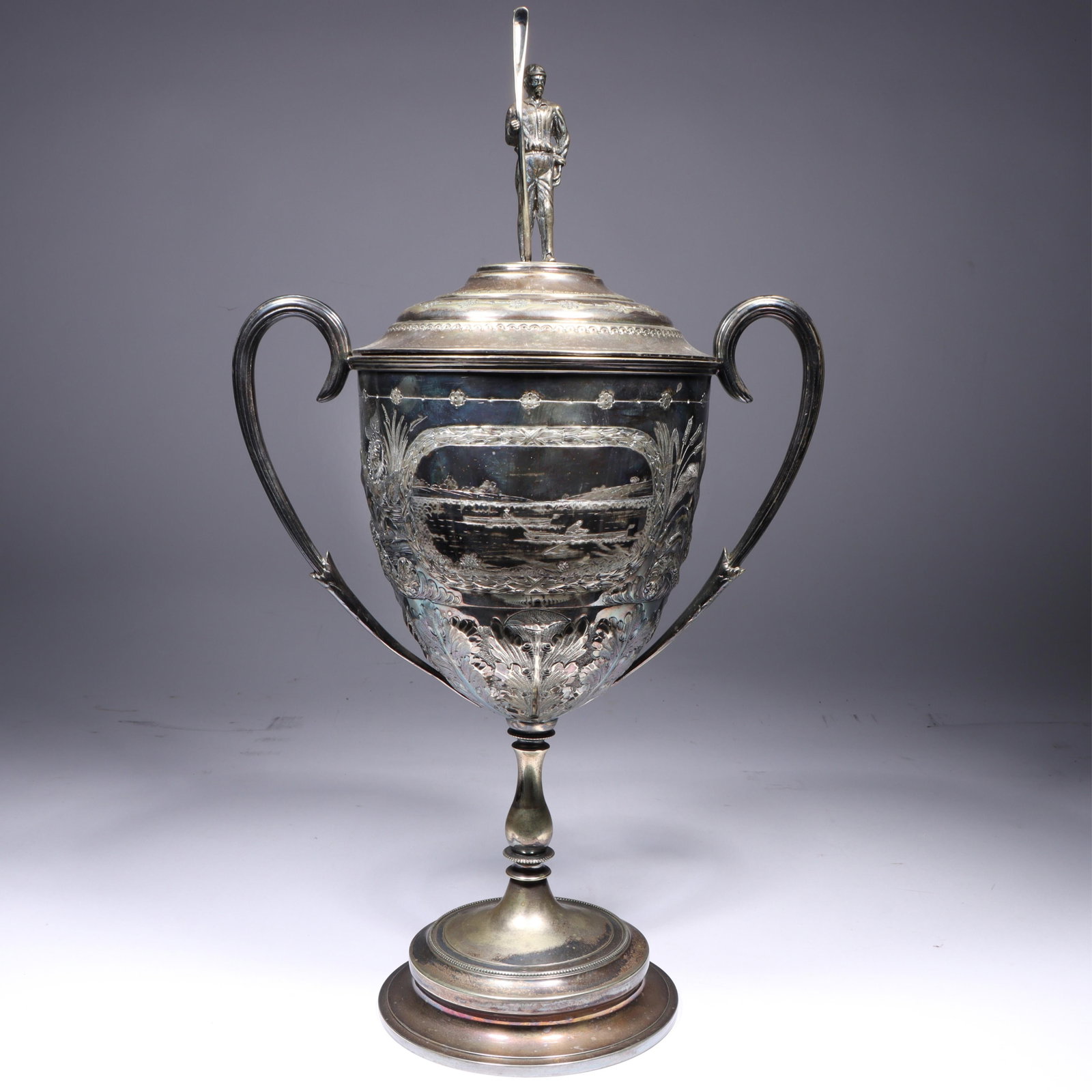 Antique 19th century silver-plated rowing trophy cup with full figure man holding an oar finial and (1 of 14)