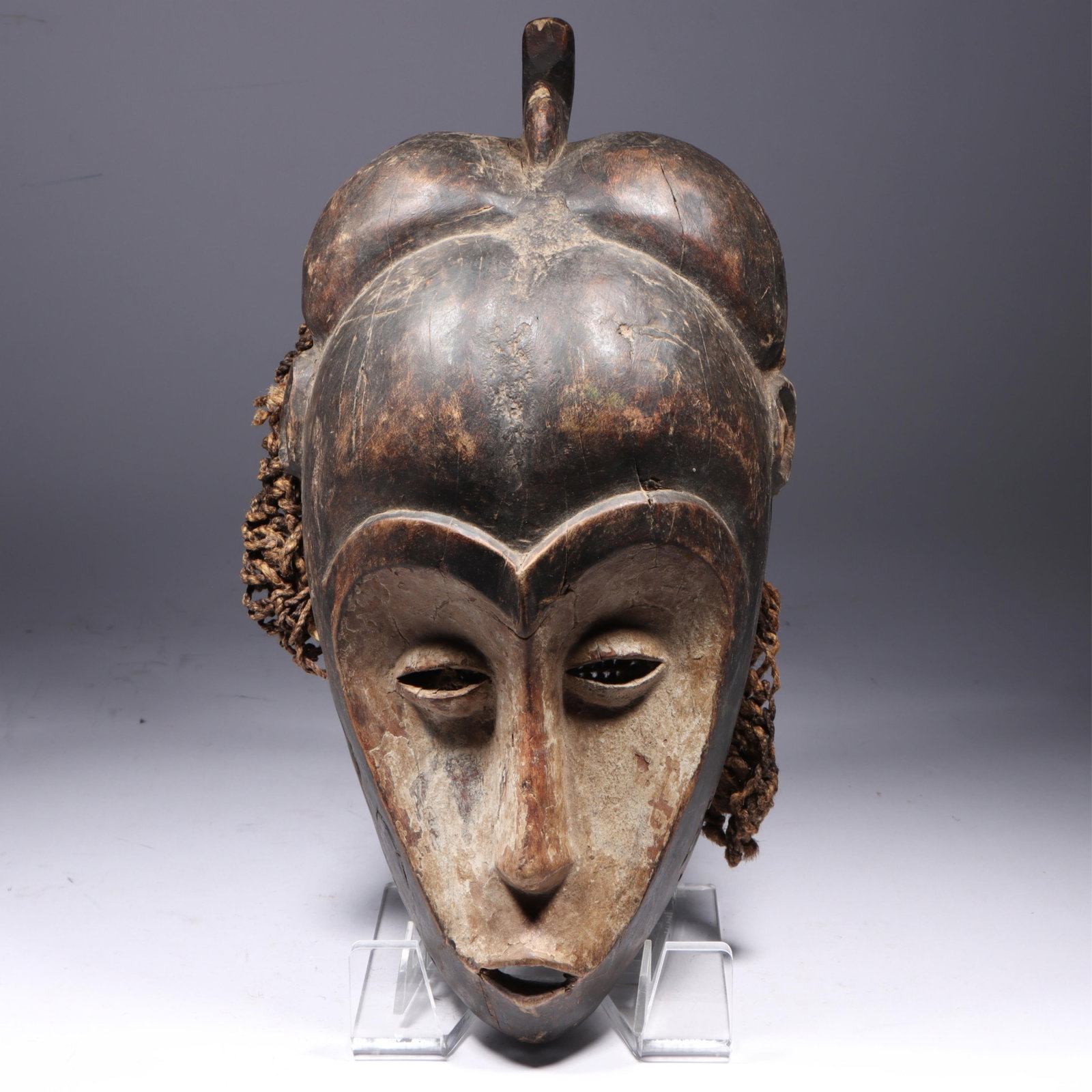 African Baule Mblo portrait carved wood tribal mask, Ivory Coast. 16 1/4"H x 8 1/4"W: African Baule Mblo portrait carved wood tribal mask, Ivory Coast. 16 1/4"H x 8 1/4"W