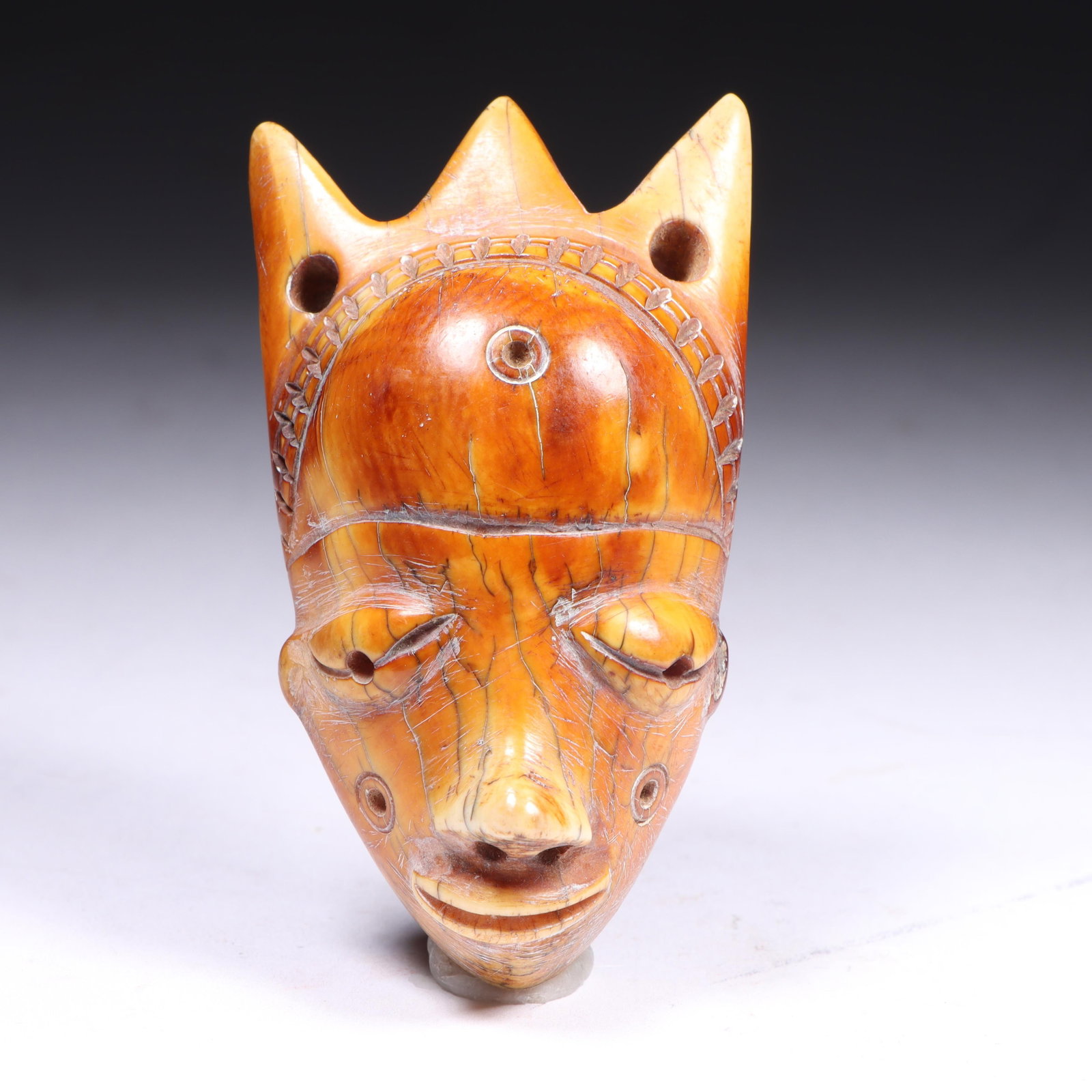 African Pende ikhoko carved bone mask pendant, Democratic Republic of Congo 3"H x 1 3/4"W (1 of 8)
