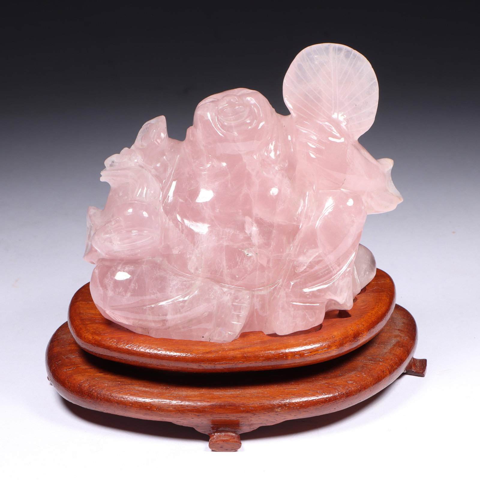Chinese carved pink rose quartz Laughing Hotai Buddha on wooden base. 3?H x 2?W x 4?D (1 of 11)