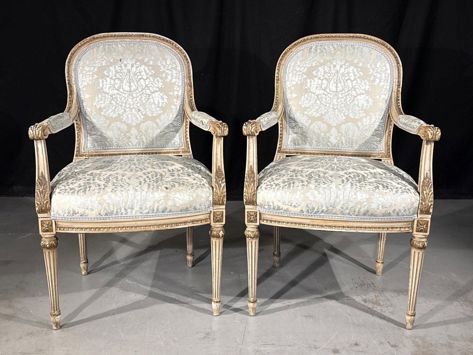 Pair Louis XVI style fauteuil armchairs with carved, painted and gilt frames and damask upholstery (1 of 9)