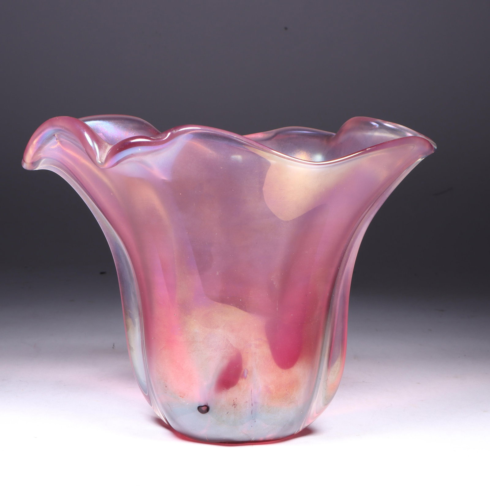 Fulvio Bianconi for Venini Murano art glass iridato vase 6 1/4"H x 8"W x 4 1/2"D: Fulvio Bianconi for Venini Murano art glass iridato vase Venini sommerso art glass vase designed by Fulvio Bianconi in the 1950s. It features an iridescent finish on a heavy fuchsia sommerso interior 