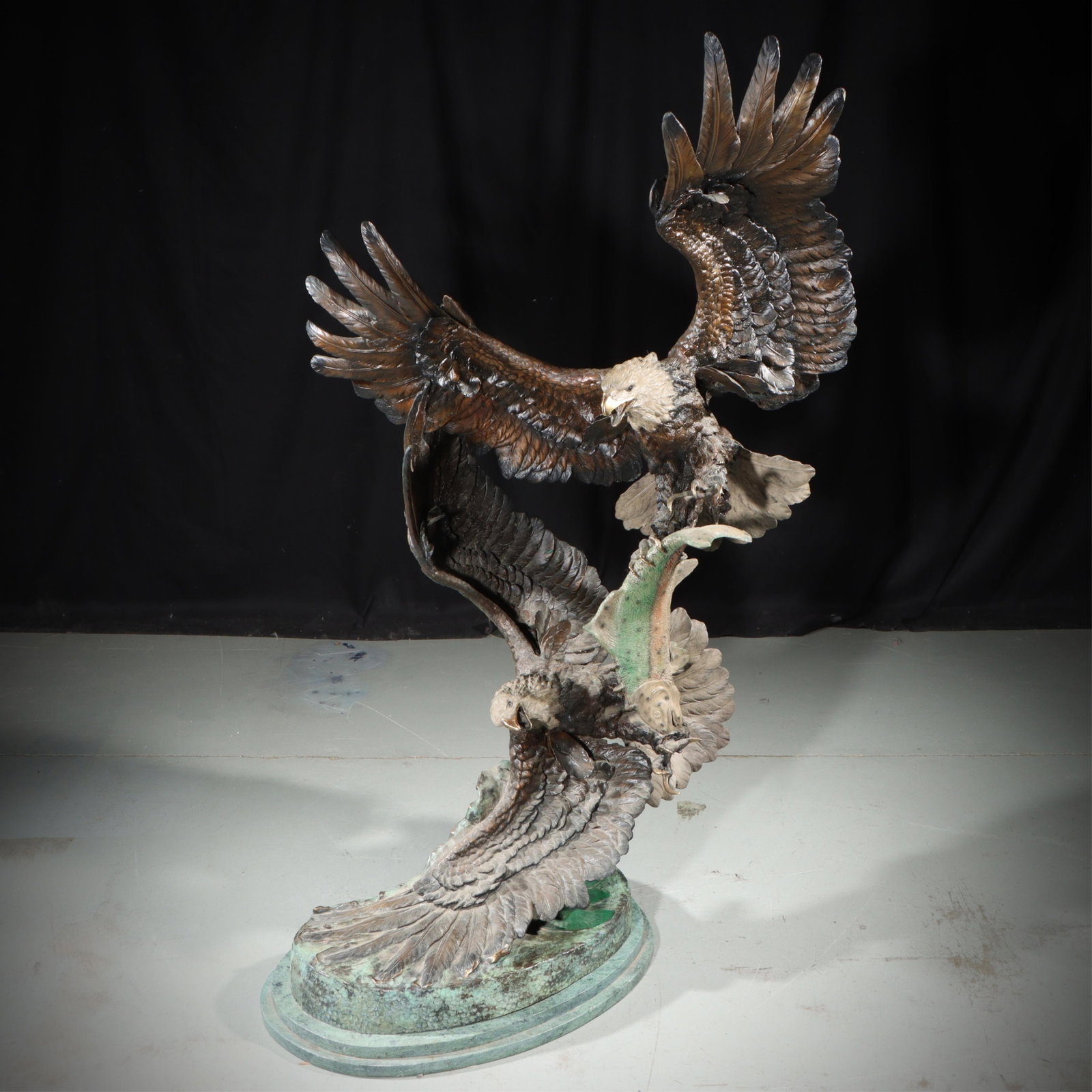 Ed Chope, American (late 20th Century), Survival III, life-size eagles figure group, patinated: Ed Chope American (late 20th Century) Survival III, life-size eagles figure group patinated bronze casting marble base signed and numbered, 130/150 47"H x35"W x 34"D