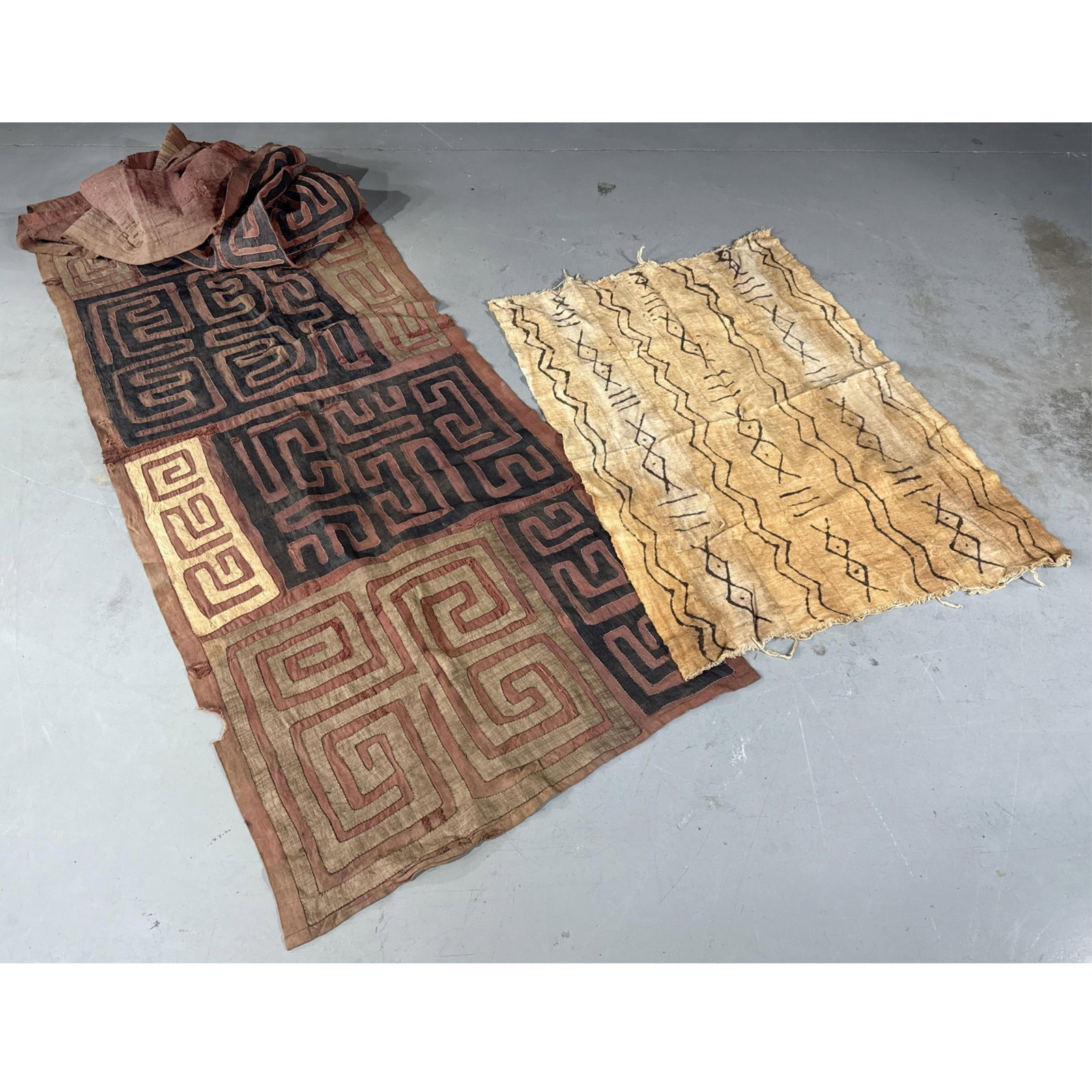 Two African textiles: kuba cloth raffia, mudcloth, ceremomial dance skirt 188?L x 35?W (largest) (1 of 5)