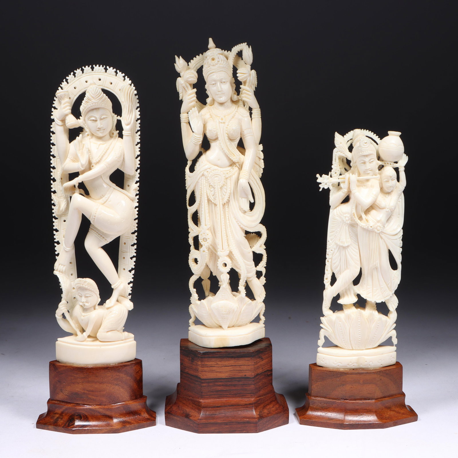 Three Antique Indian Hindu deity carved bone statuette sculptures mounted on wooden bases 8 1/4"H x (1 of 12)