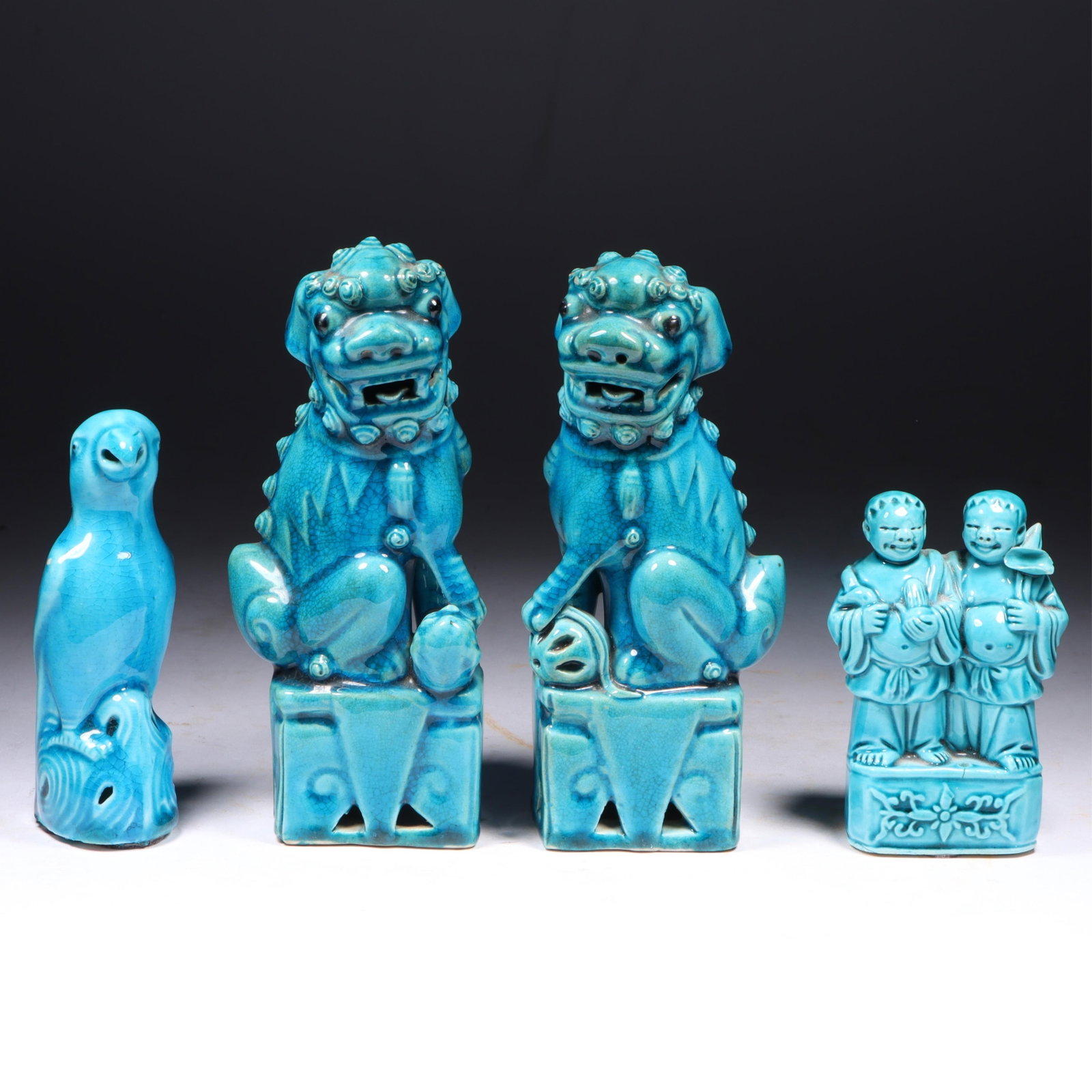 Four Chinese turquoise glazed porcelain figurines: parrot, foo dogs, immortal figures, 6?H (tallest) (1 of 7)