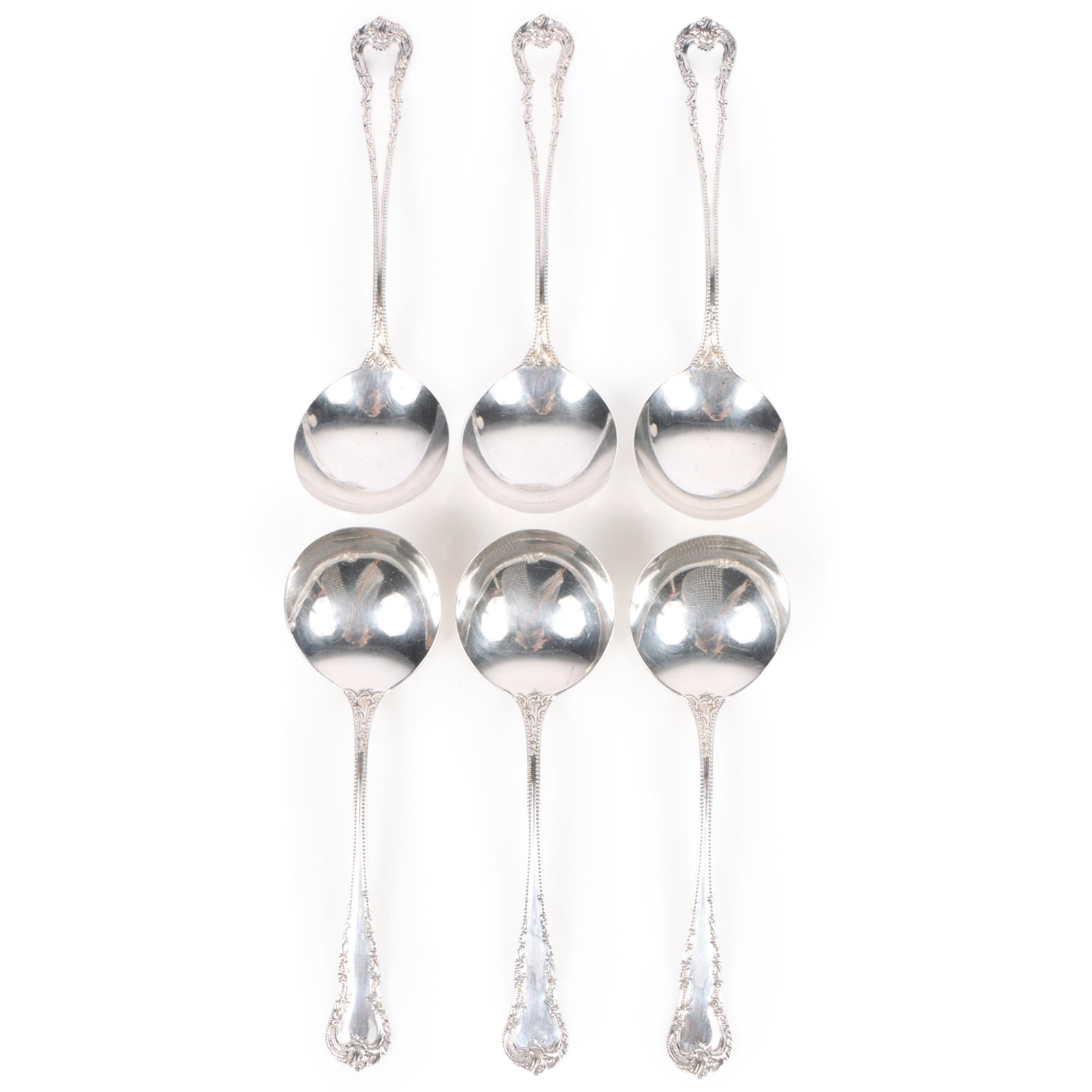 Six sterling silver round bowl cream soup spoons marked S.C.L. Co., 4.341 Troy Oz. 5 1/2"H x 1 1/2"W: Six sterling silver round bowl cream soup spoons marked S.C.L. Co., 4.341 Troy Oz. 135g. 5 1/2"H x 1 1/2"W (one spoon)