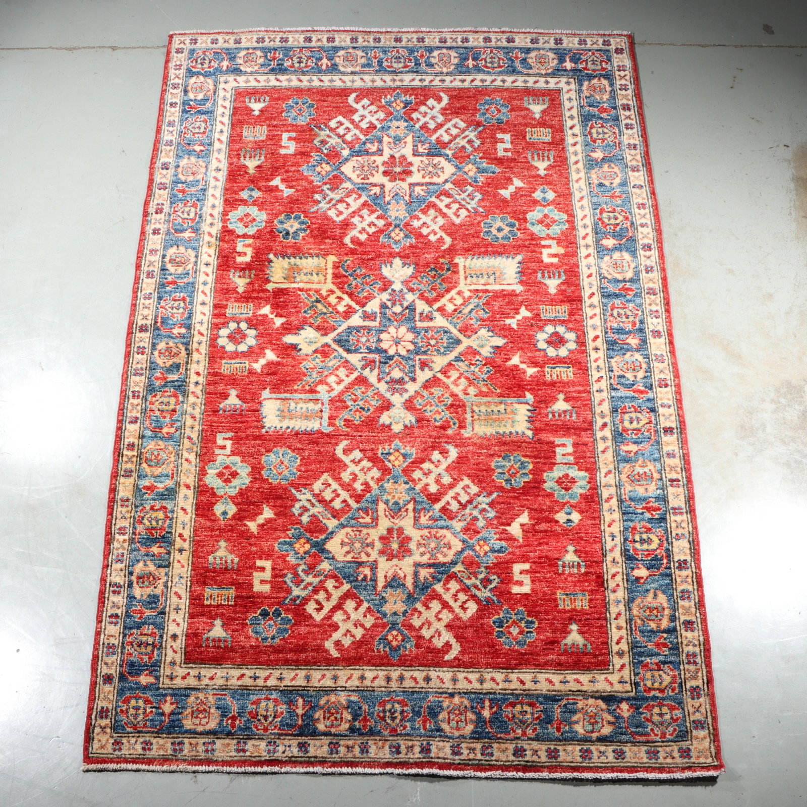 Kazak Pakistani? red ground vintage hand knotted Oriental wool estate rug / carpet. (1 of 9)