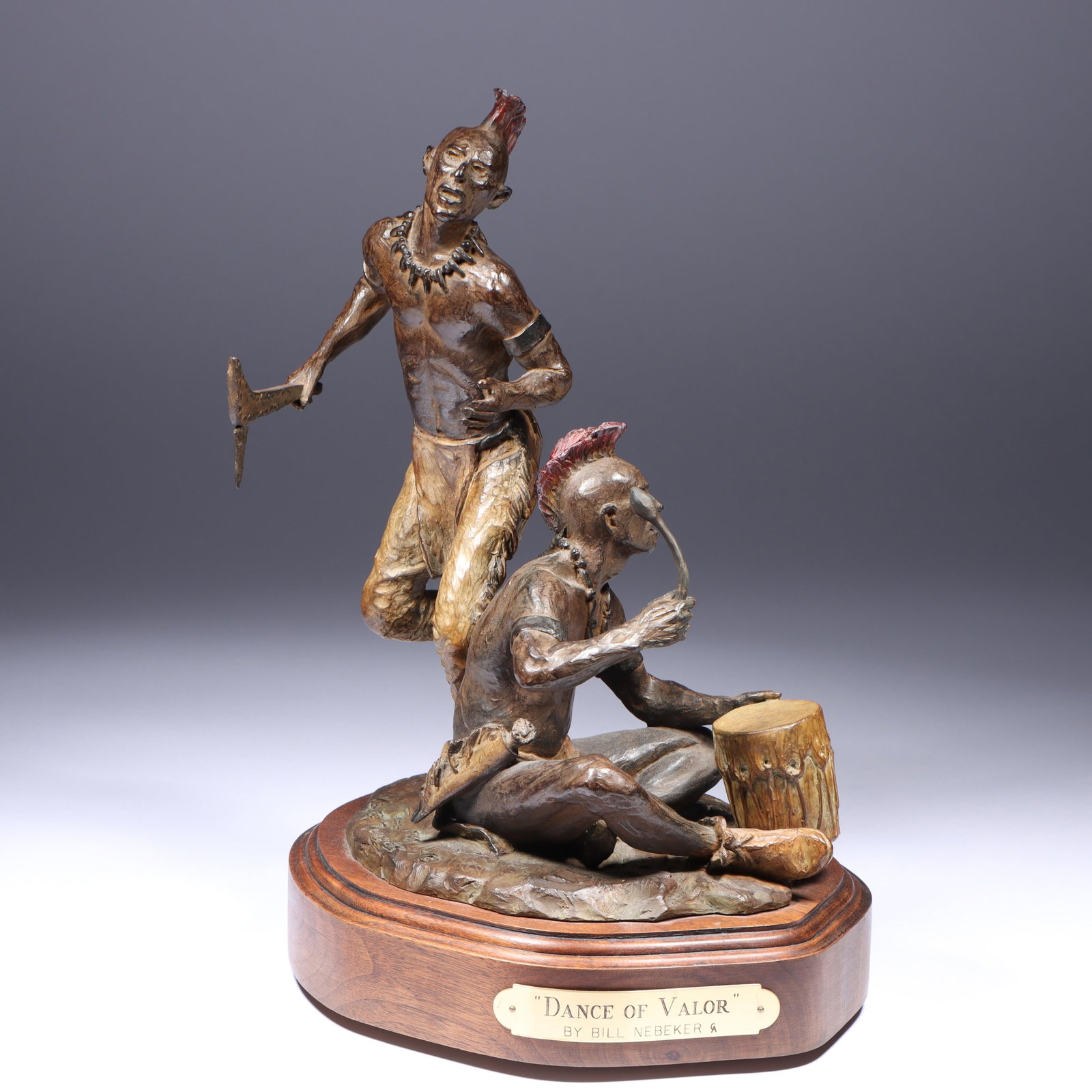 Bill Nebeker, American (b. 1942), Dance of Valor, 1989, bronze, 11 1/2"H x 8 1/2"W: Bill Nebeker American (b. 1942) Dance of Valor, 1989 bronze Incised signature and date at base, numbered 7/30. Biography from the Archives of askART Known for his detailed, well researched sculpture o
