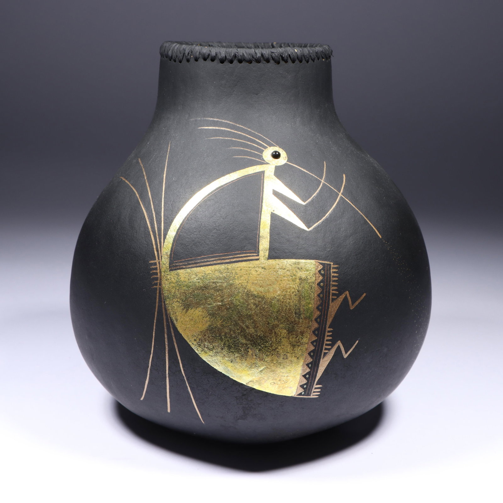 Robert Rivera (20th/21st century) Southwestern "Flute Player" gourd vessel, 1992, 7 1/4"H x 6: Robert Rivera (20th/21st century) Southwestern "Flute Player" gourd vessel, 1992 Signed and dated under base. Minor paint chips on bottom. 7 1/4"H x 6 1/2"Diam.