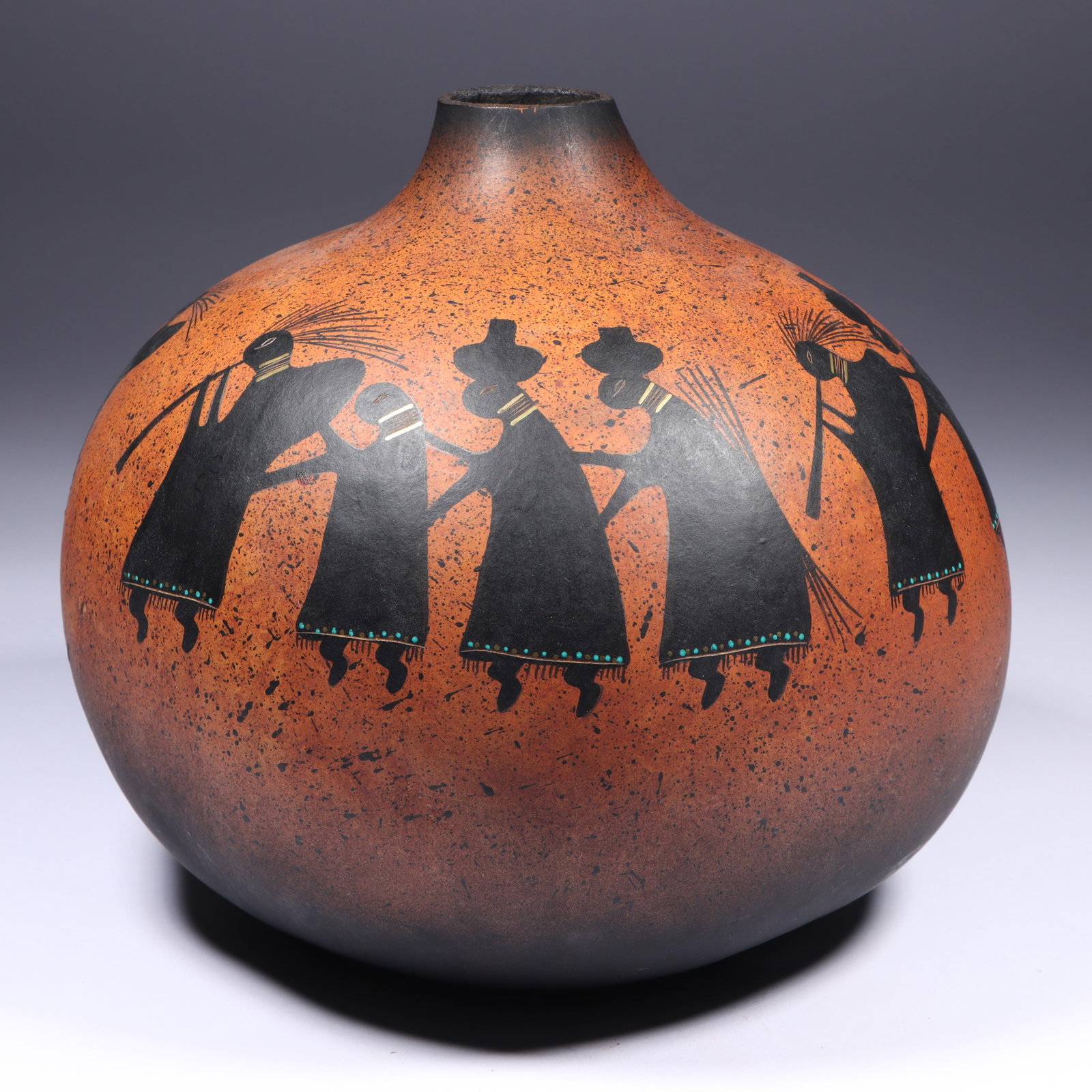 Robert Rivera (20th/21st century) Southwestern polychrome "Flute Players" gourd vessel, 1990 7"H x 7: Robert Rivera (20th/21st century) Southwestern polychrome "Flute Players" gourd vessel, 1990 A hand-painted gourd vessel by Robert Rivera, featuring Southwest-style motifs with figures in traditional 