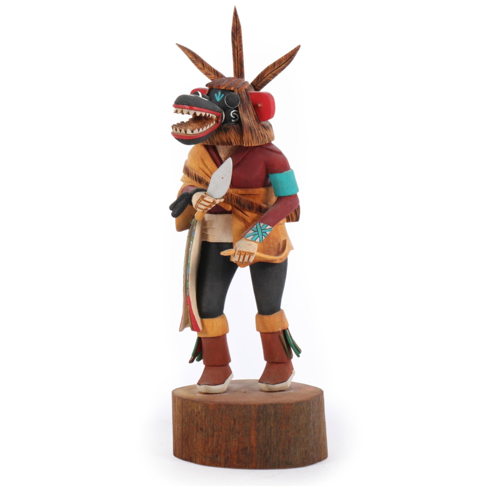 Hopi Native American carved and painted Ogre kachina figure by Carlton Timms 14 3/4" x 5"W x 4 1/2"D: Hopi Native American carved and painted Ogre kachina figure by Carlton Timms Incised signature under base. Several broken feathers. Provenance: purchased at Secakuku Trading Post. 14 3/4" x 5"W x 4 1/
