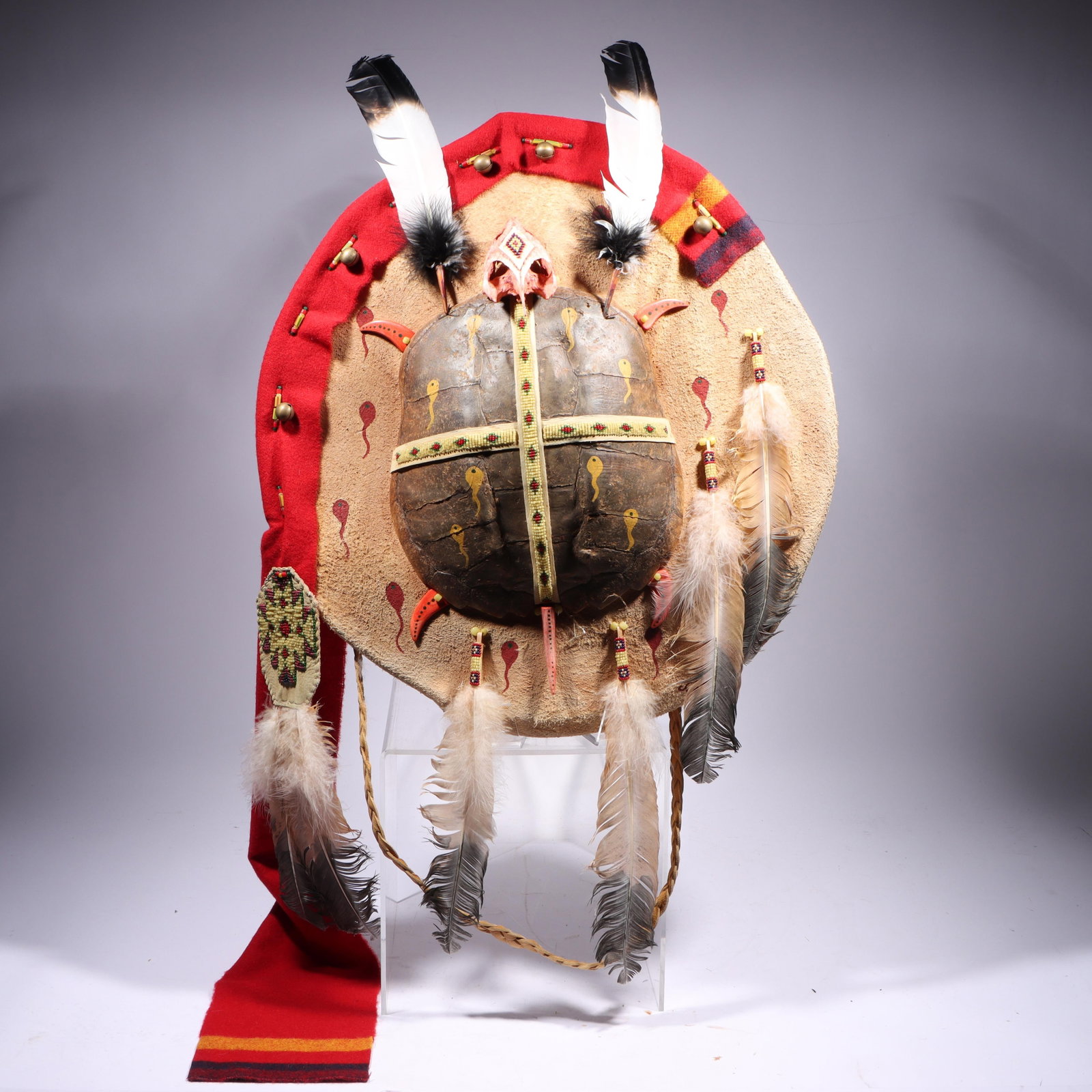 Native American style turtle shell and hide shield adorned with feathers, beads, and textile 46"H x (1 of 15)