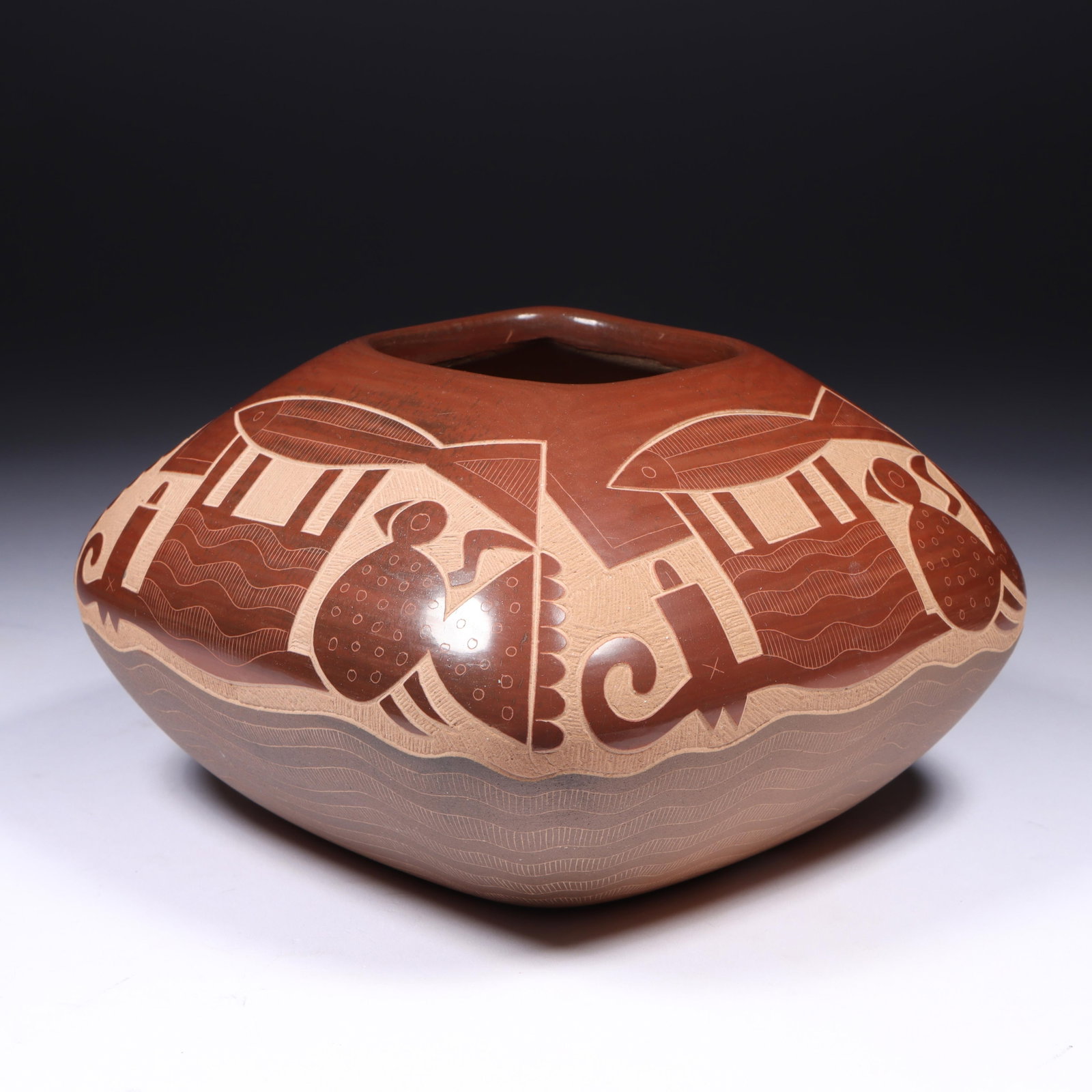 Jody Naranjo (b. 1969) Santa Clara Pueblo Native American "Hunted Animals" sgraffito pottery vessel: Jody Naranjo (b. 1969) Santa Clara Pueblo Native American "Hunted Animals" sgraffito pottery vessel depicting birds and fish, 2005 Incised signature and dated under base. A contemporary etched pottery
