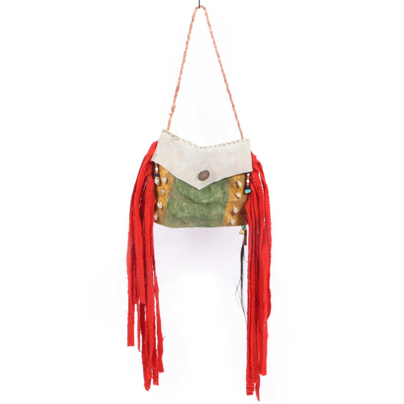 Lance Grabowski artisan made dyed animal hide bag adorned with shells and beads 7 3/4"H x 9: Lance Grabowski artisan made dyed animal hide bag adorned with shells and beads A handcrafted bag from Lance Grabowski, a mix of materials, including brass bells and horse hair. The bag has a green an