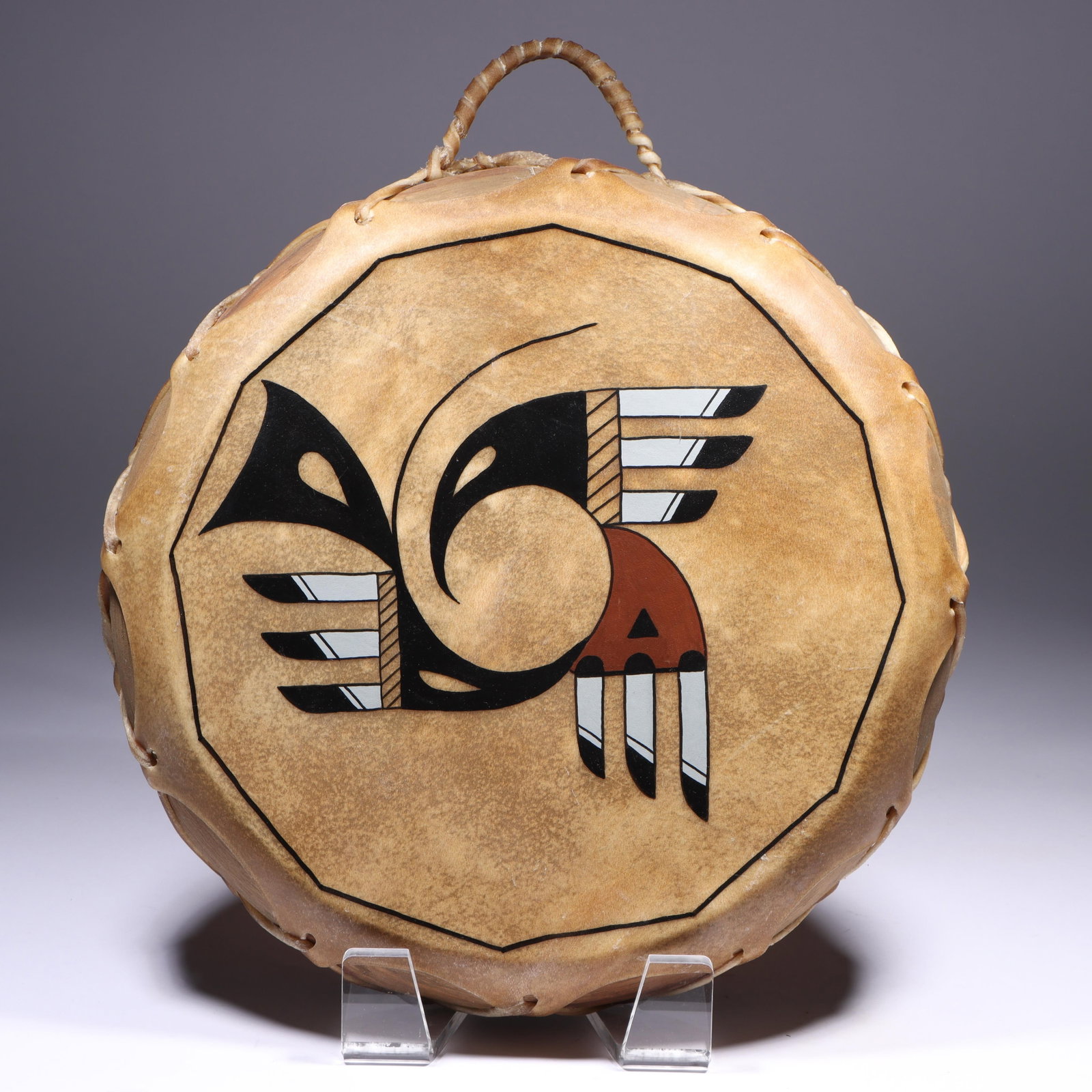 Pueblo Native American painted hide over wood framed drum with stylized bird design, 1993, 15 1/2"H (1 of 9)