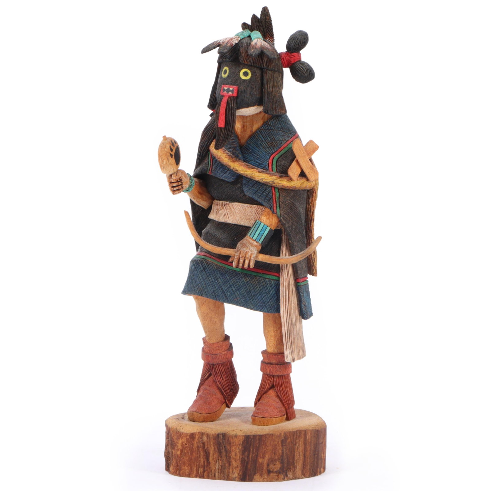 Hopi Native American carved and painted Warrior Maiden Kachina figure by Rick James, 1997 11 3/4"H x: Hopi Native American carved and painted Warrior Maiden Kachina figure by Rick James, 1997 Signed and dated under base. Provenance: purchased at Secakuku Trading Post, 5/99 11 3/4"H x 4"W x 3 1/2"D
