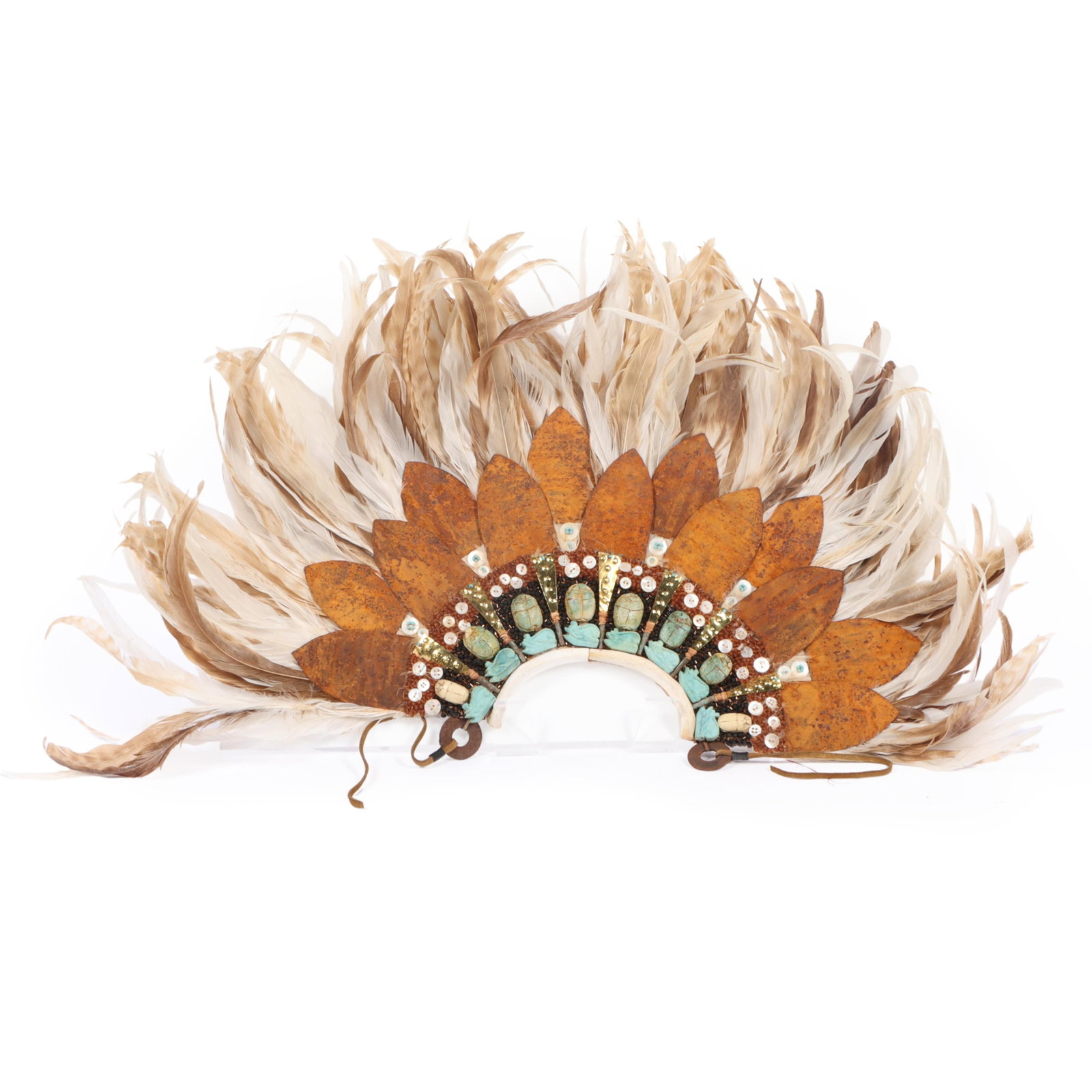 Jay Lewis (20th century) Horus Collar adorned with feathers, patinated metal, buttons, scarab and: Jay Lewis (20th century) Horus Collar adorned with feathers, patinated metal, buttons, scarab and eye of Rah beads Some loose feathers present. 19"H x 32"W