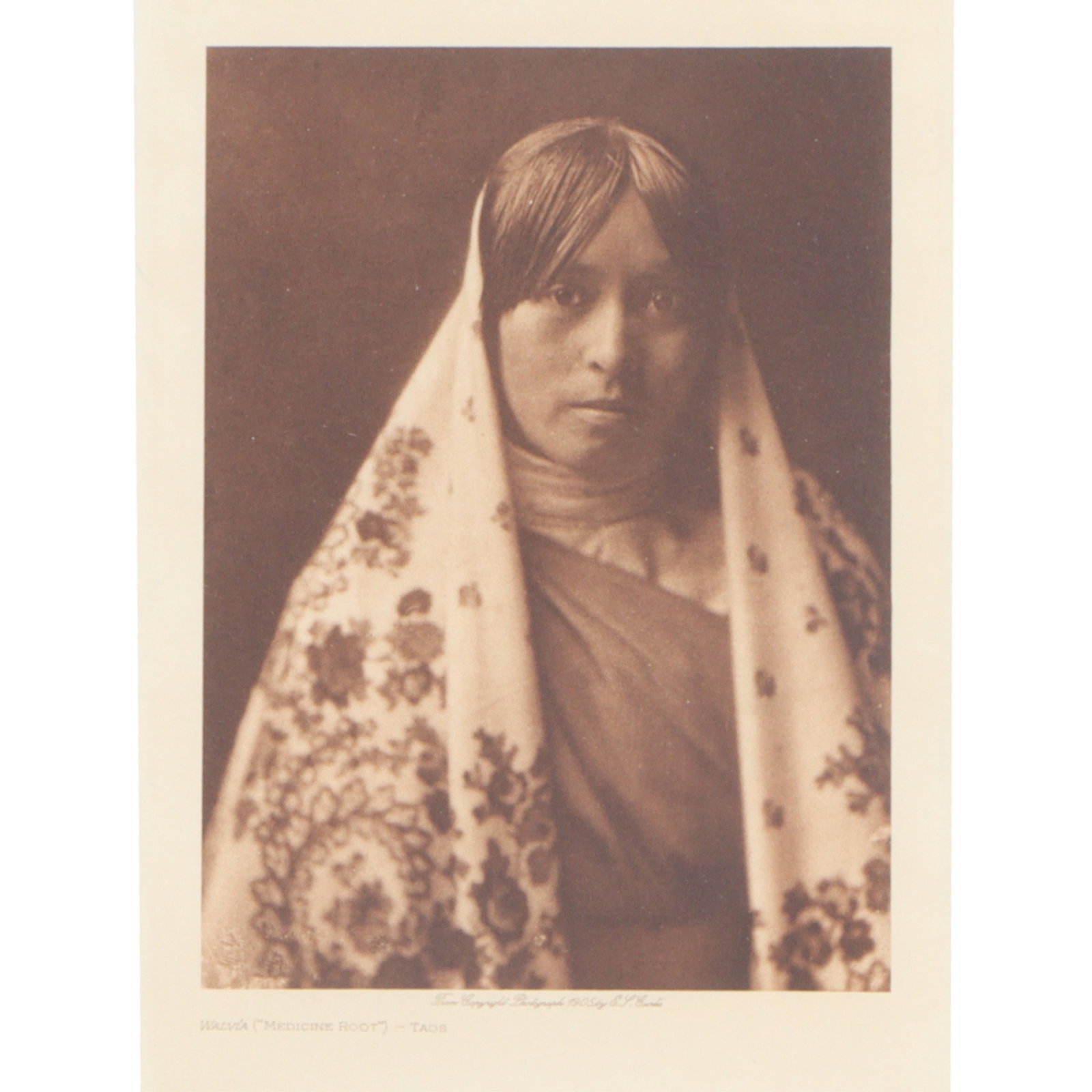 Edward S Curtis, American (1868–1952), Walvia (Medicine Root) - Taos, Photogravure, 9 1/4"H x 6: 18'H X 14 3/4"W(frame)Description:Edward S CurtisAmerican, (1868–1952)Walvia (Medicine Root) - TaosPhotogravureFramed portrait of an original photogravure titled Walvia (Medicine Root) - Taos, photo