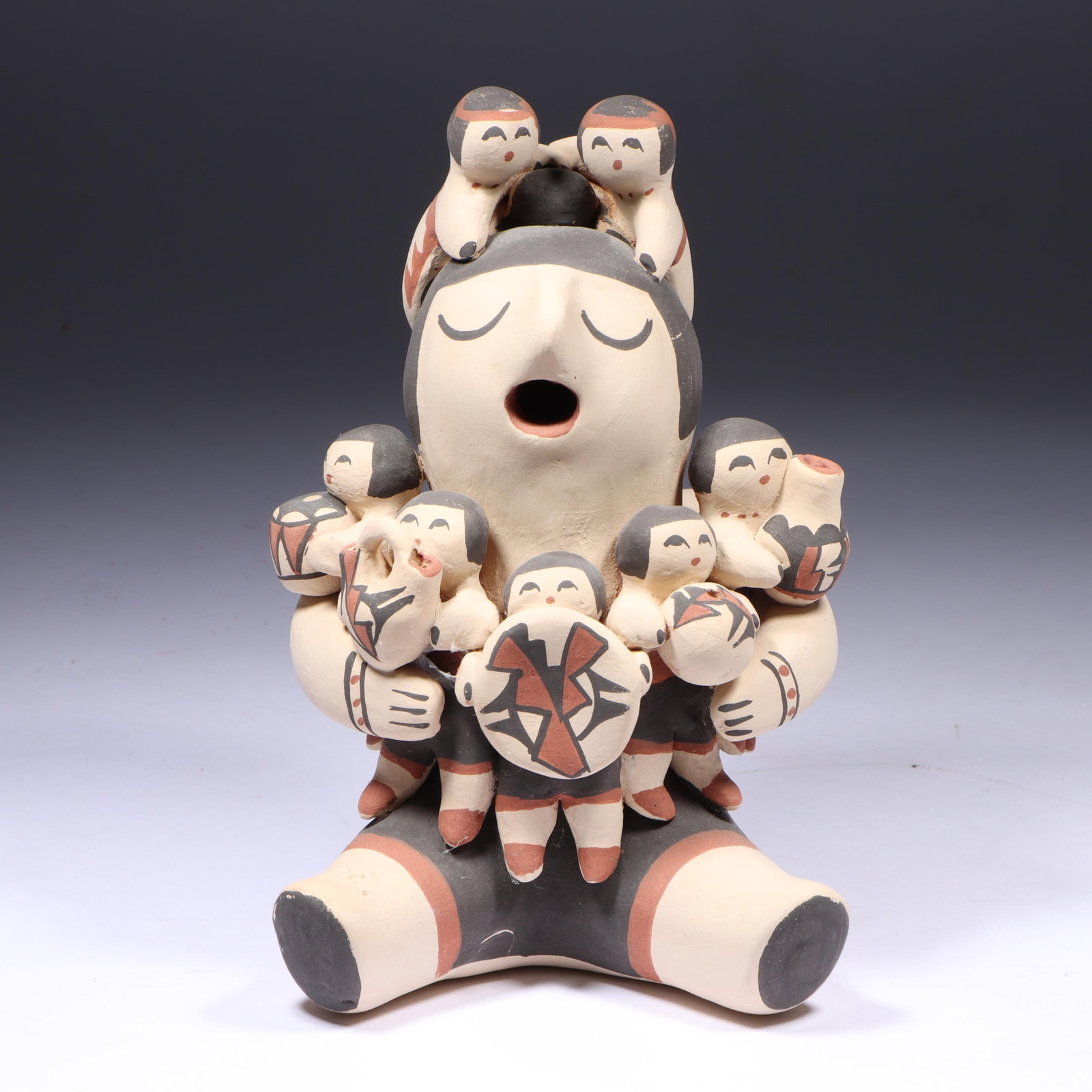 Mary Ellen Toya, Jemez Pueblo (20th Century), storyteller, polychrome pottery figure, 8"H x 5"W (1 of 11)