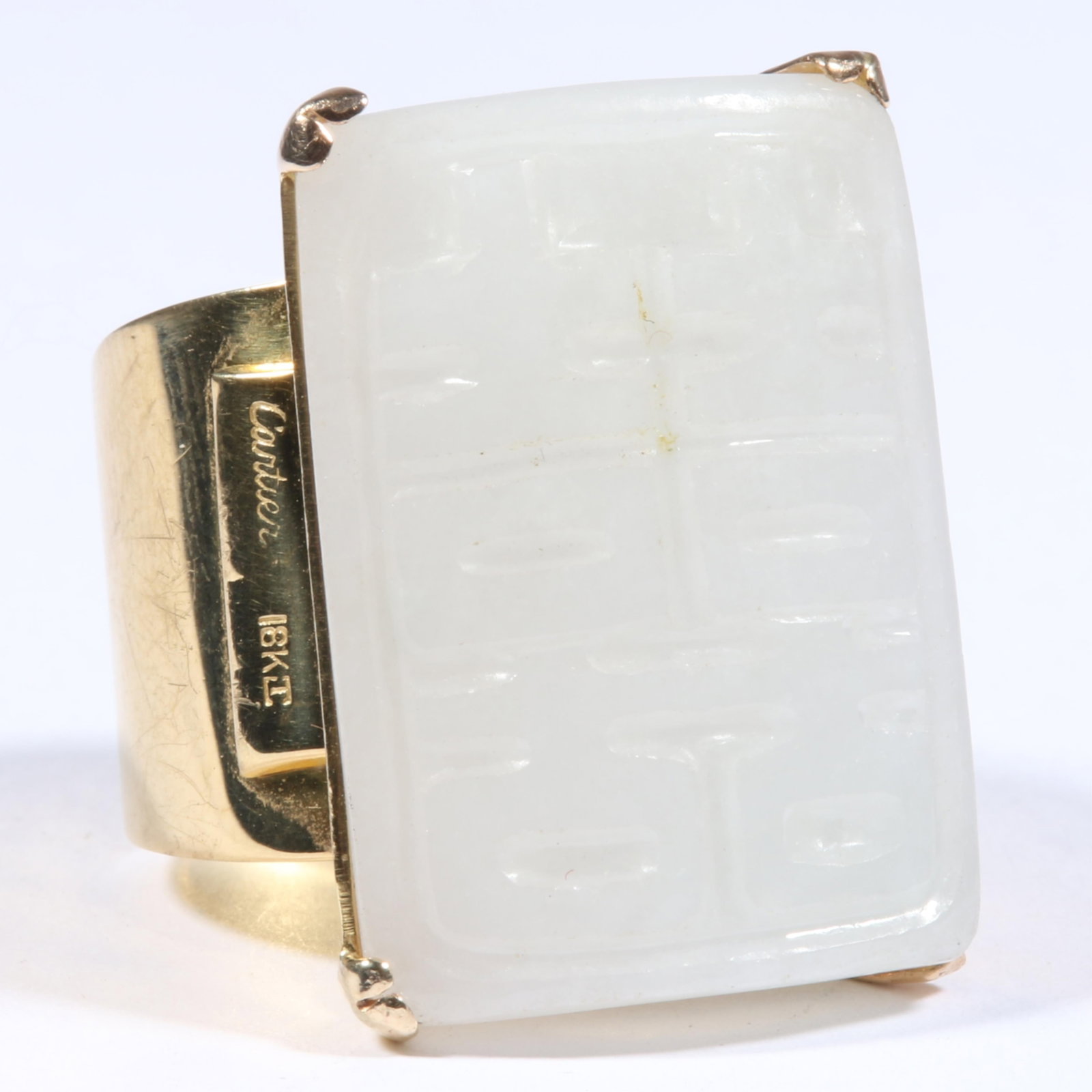 18K Yellow Gold Icy White Nephrite Jade Ring Relief-Carved with Double Happiness Symbol Custom-Made: 18K Yellow Gold Icy White Nephrite Jade Ring Relief-Carved with Double Happiness Symbol Custom-Made from a Cartier Money Clip 12.90 dwt. Jadeite exhibits a semi-translucent quality and is in good cond