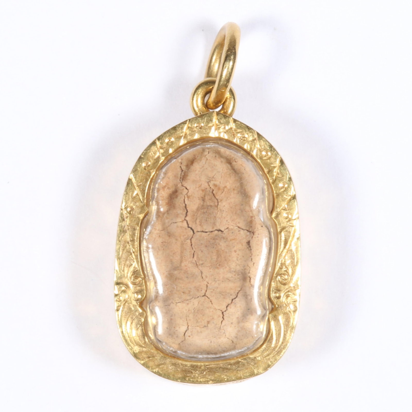 18K Yellow Gold Engraved Thai Buddhist Amulet or Phra Somdej Pendant, Unmarked, Tested 1 1/4"H x: 18K Yellow Gold Engraved Thai Buddhist Amulet or Phra Somdej Pendant, Unmarked, Tested 4.64 dwt. These were made by the monks with a mixture from a blend of chalk powder, crushed limestone, holy water