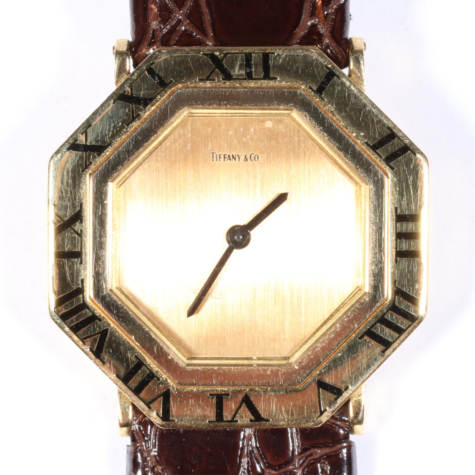 Tiffany & Co. 18K Yellow Gold 17 Jewel Swiss Made Women's Octagonal Wristwatch with Roman Numerals: Tiffany & Co. 18K Yellow Gold 17 Jewel Swiss Made Women's Octagonal Wristwatch with Roman Numerals 18.30 dwt Not running, has been serviced in the past. The purchase of gold requires confirmed funds. 
